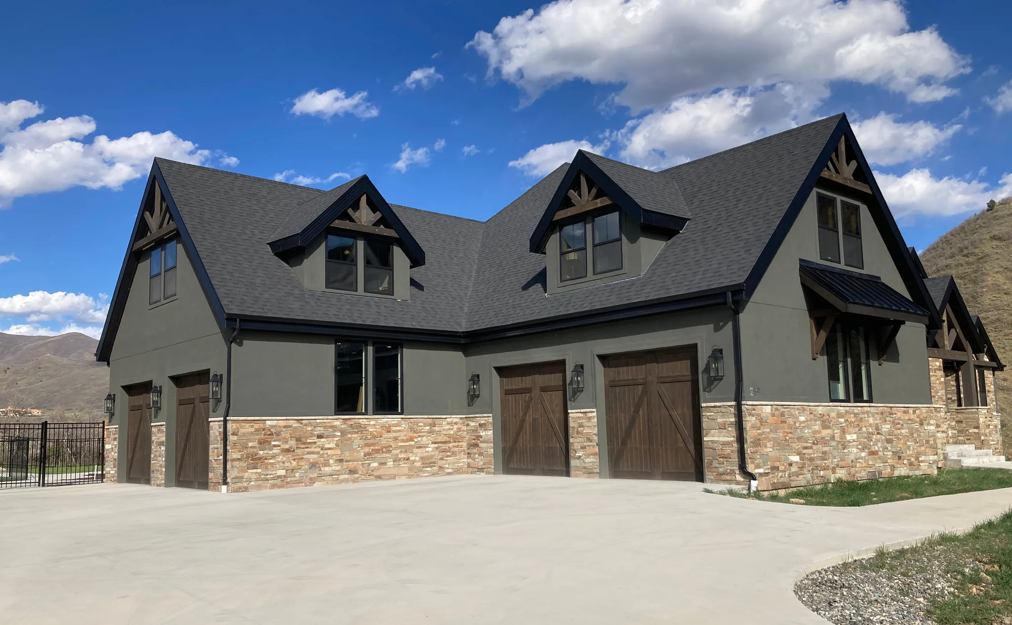 Driveway and large four car garage.
