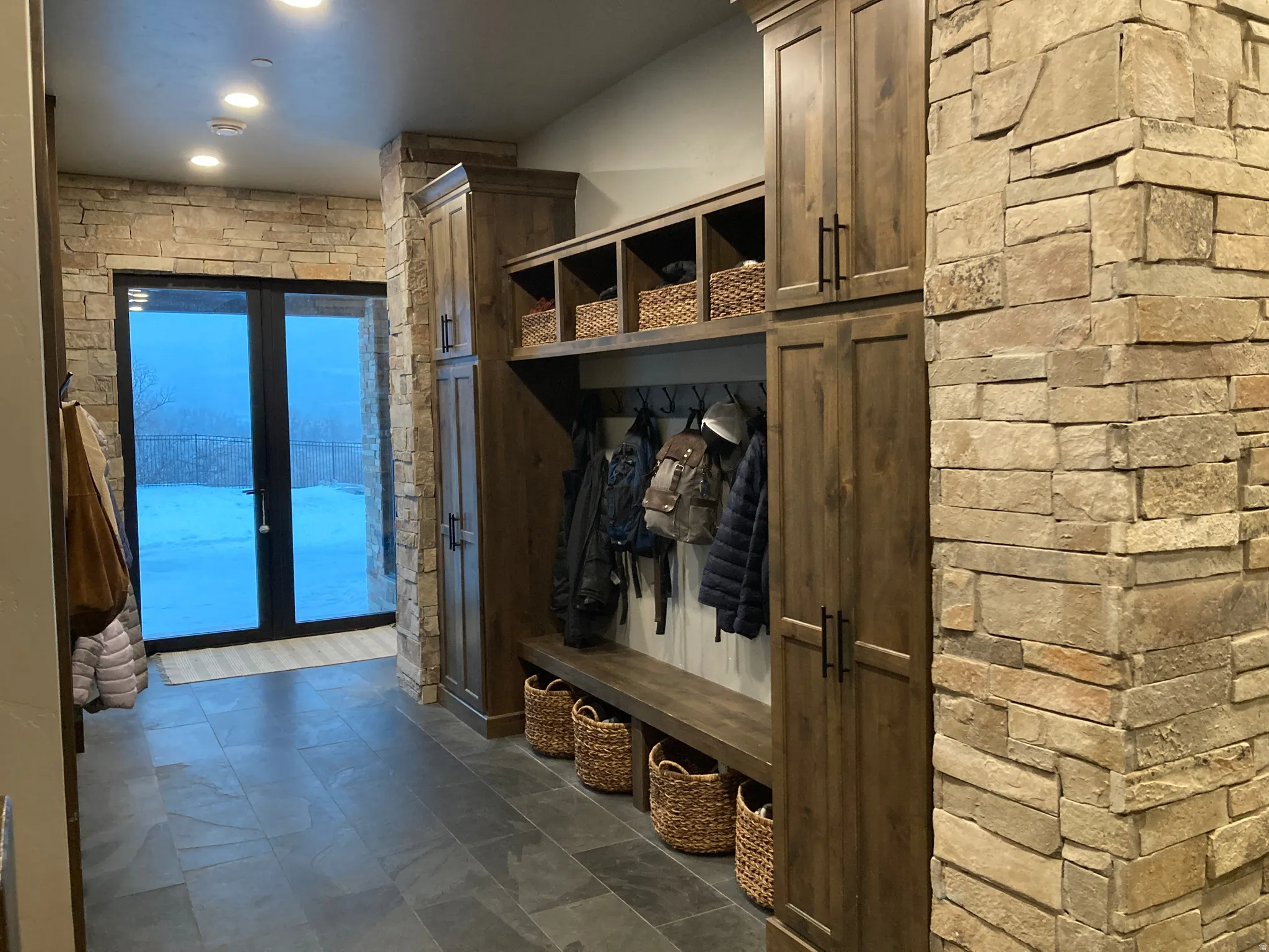 Mudroom featuring recessed lighting and french doors