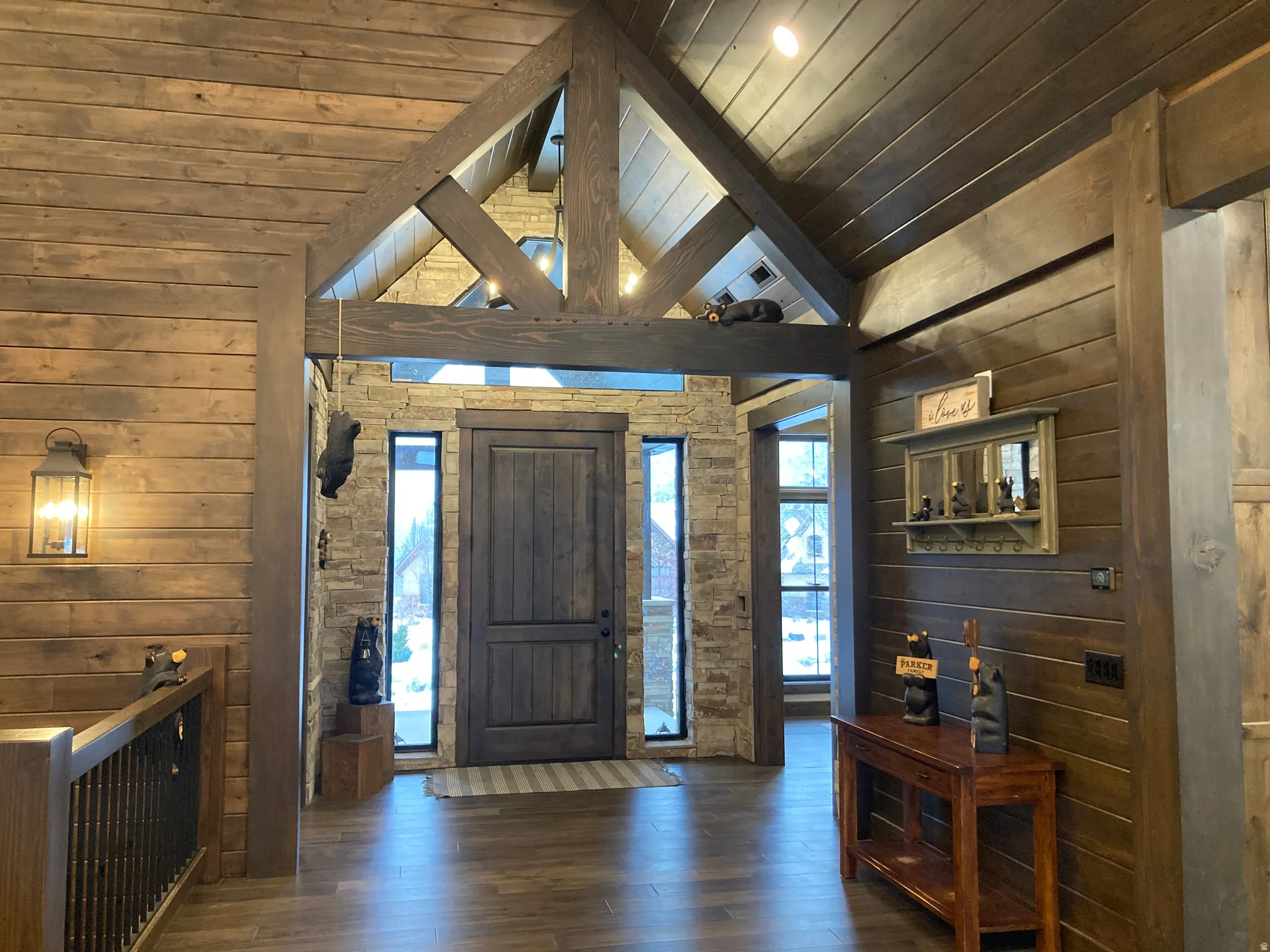 Front entrance with wood beams.