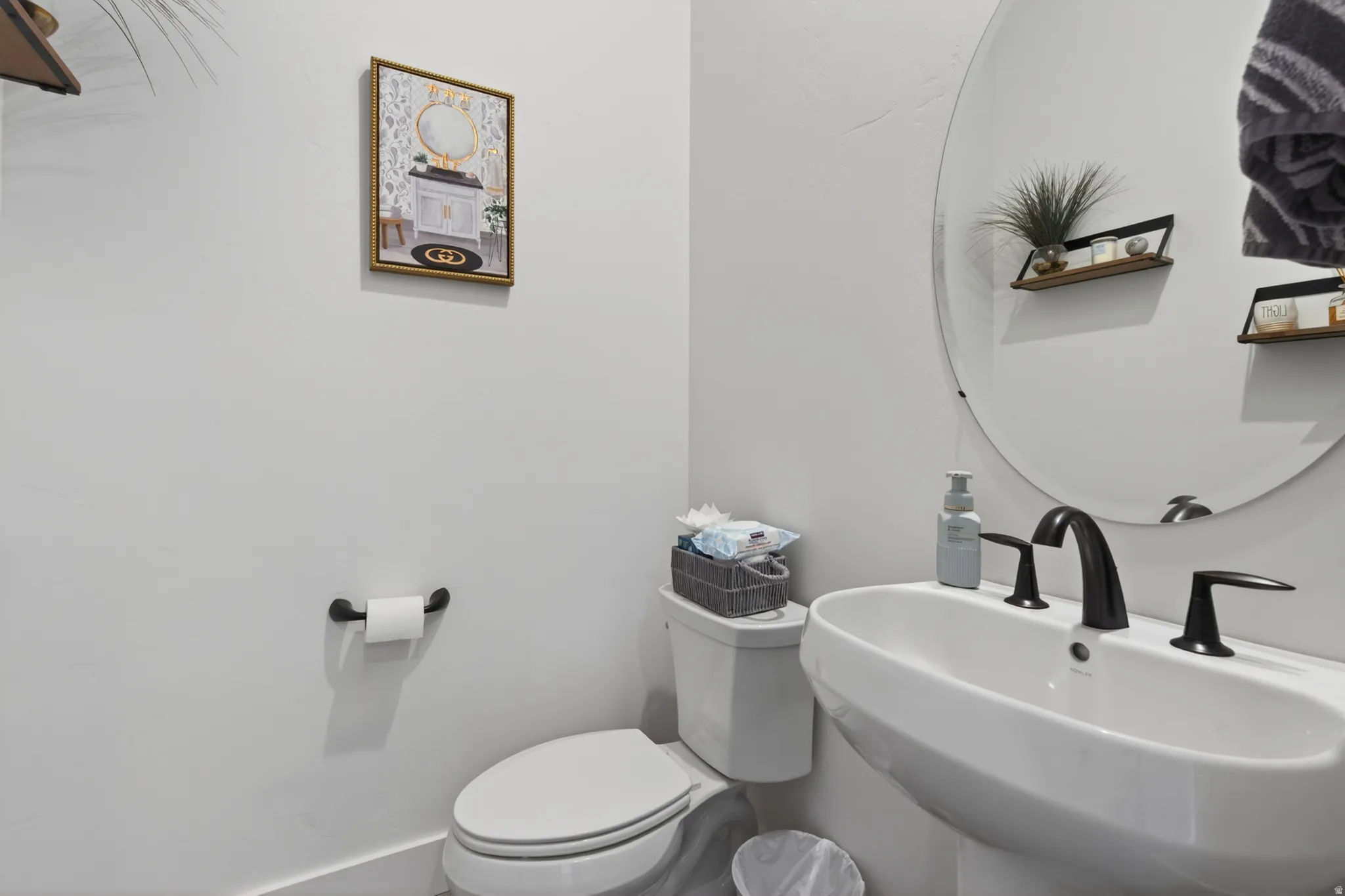 Bathroom featuring a sink and toilet