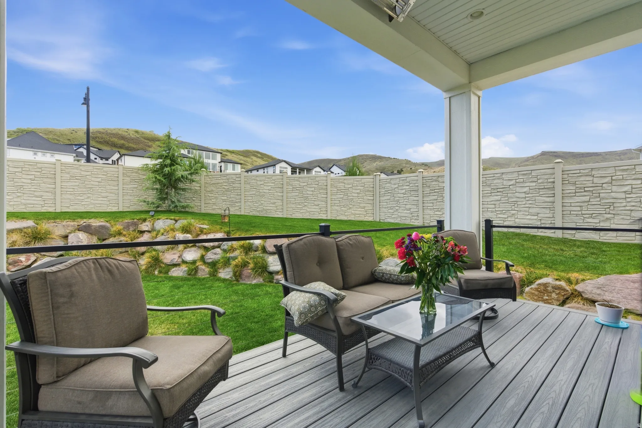 Deck featuring a fenced backyard and an outdoor lounge area