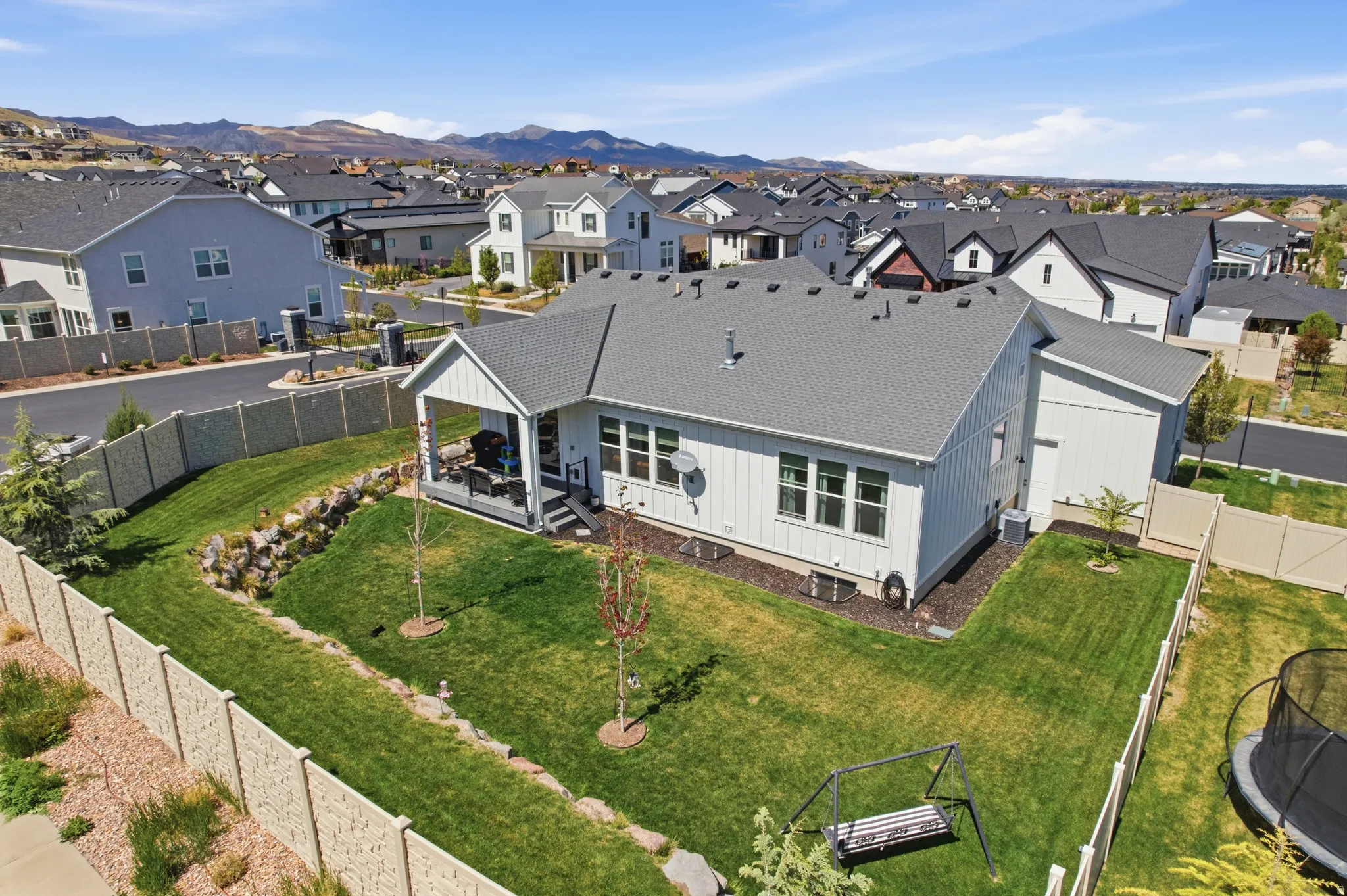 Aerial view of residential area with a mountainous background