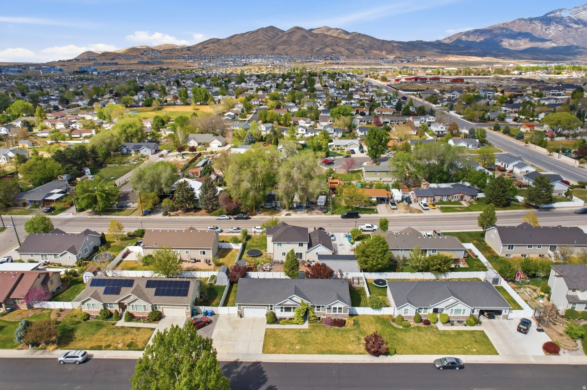 Aerial perspective of suburban area with mountains