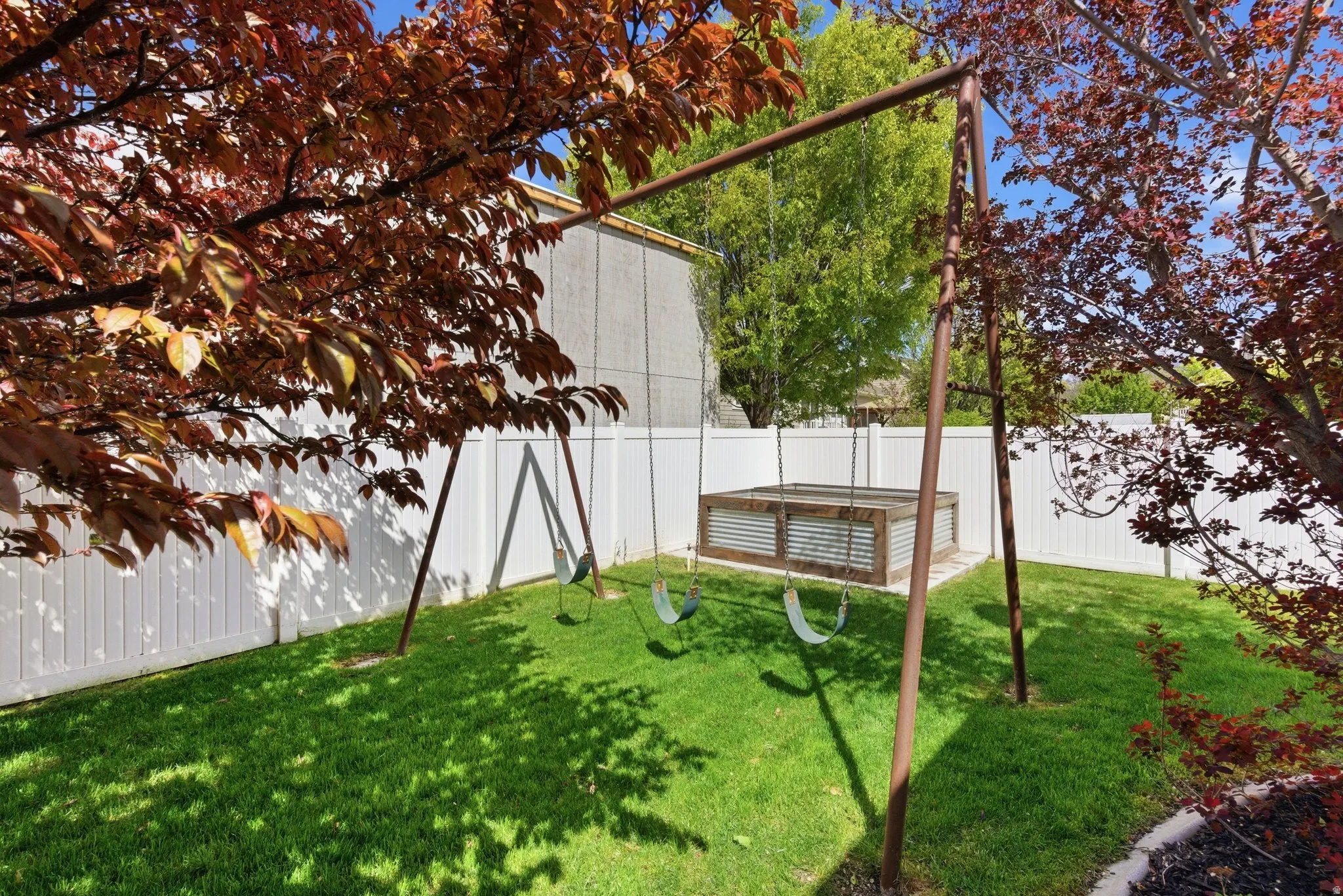 View of fenced backyard