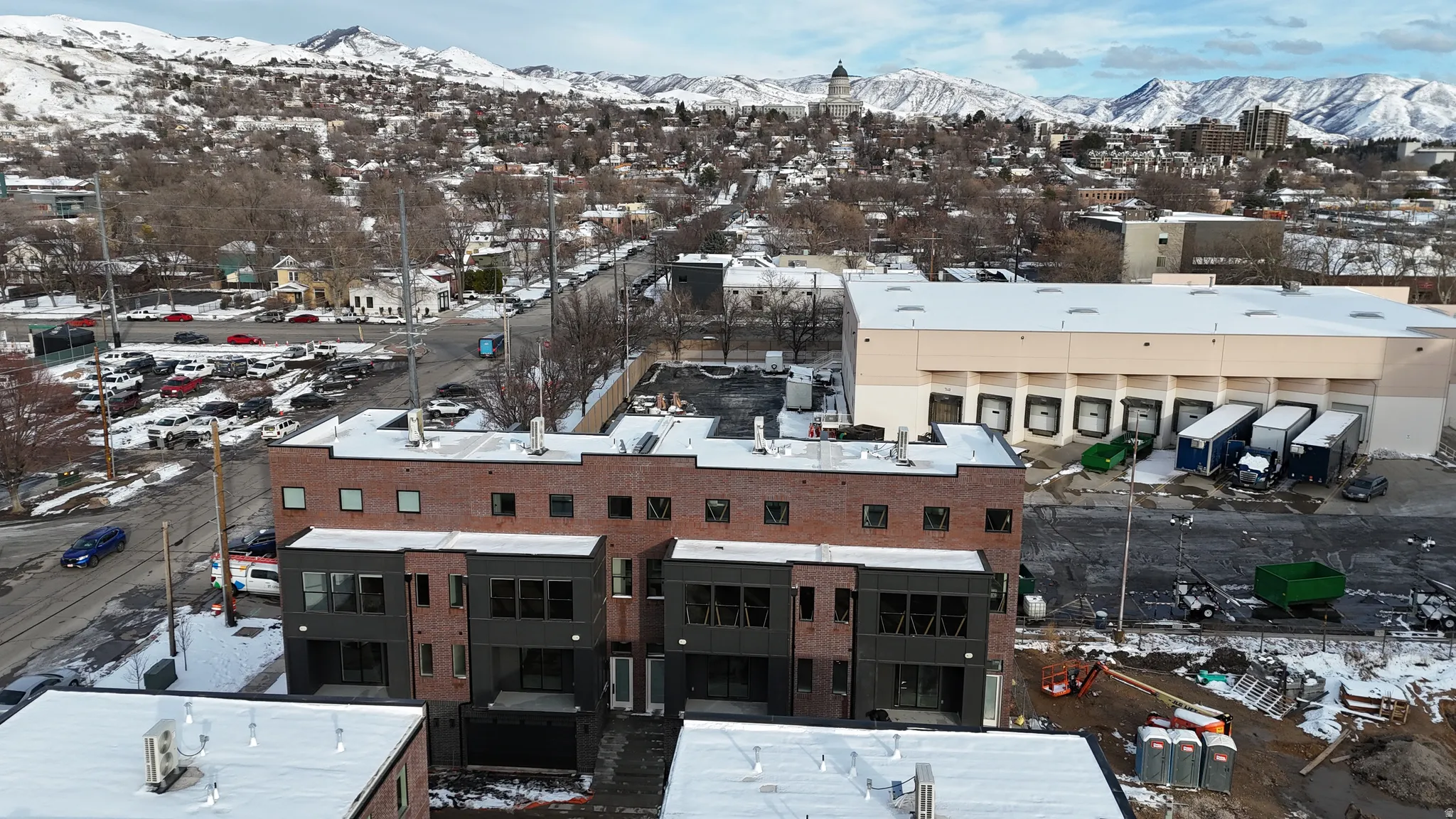 Snowy aerial view with a mountain view