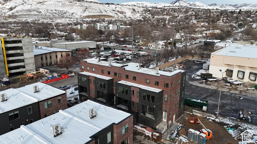 Snowy aerial view with a mountain view