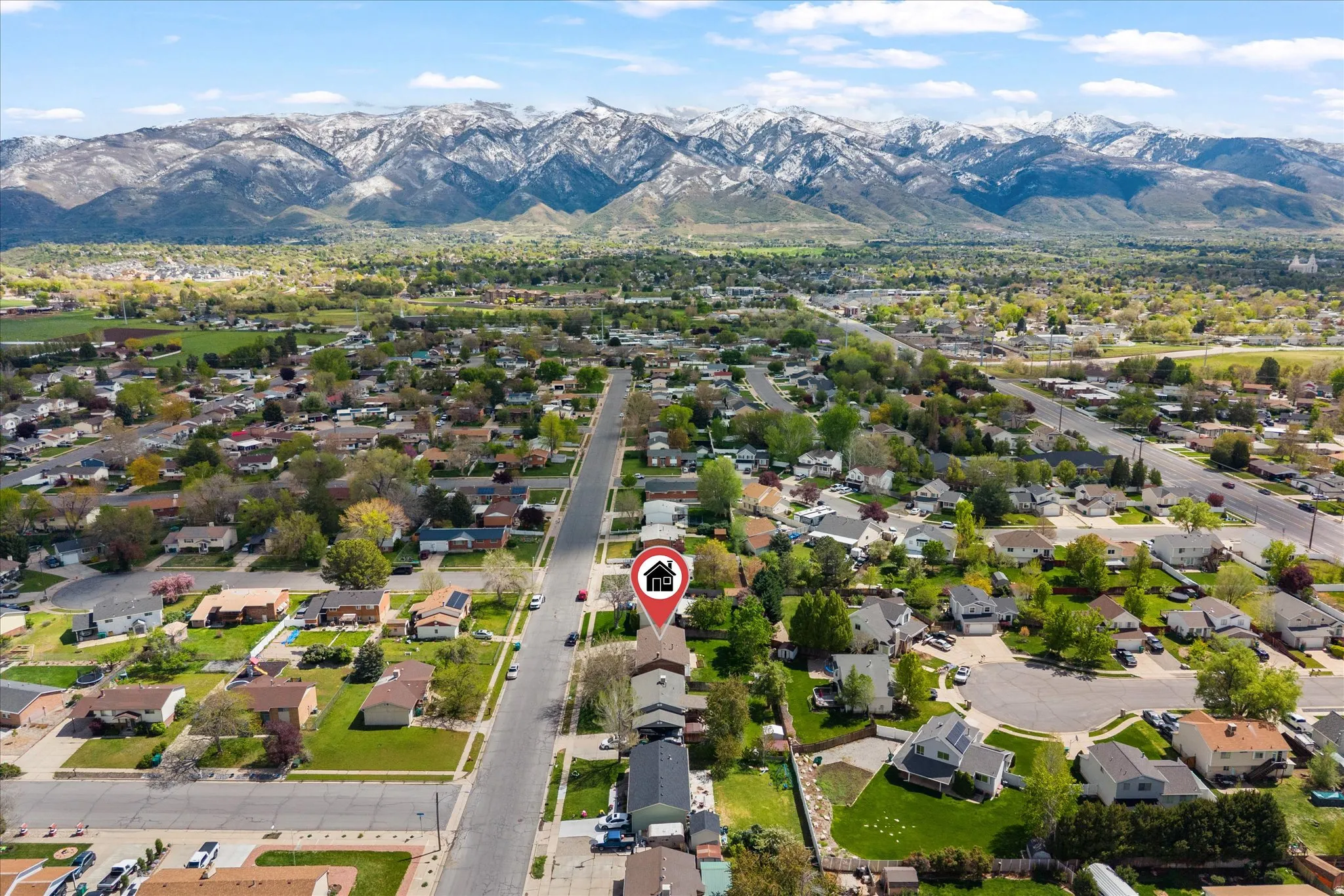 Aerial view of residential area with a mountainous background