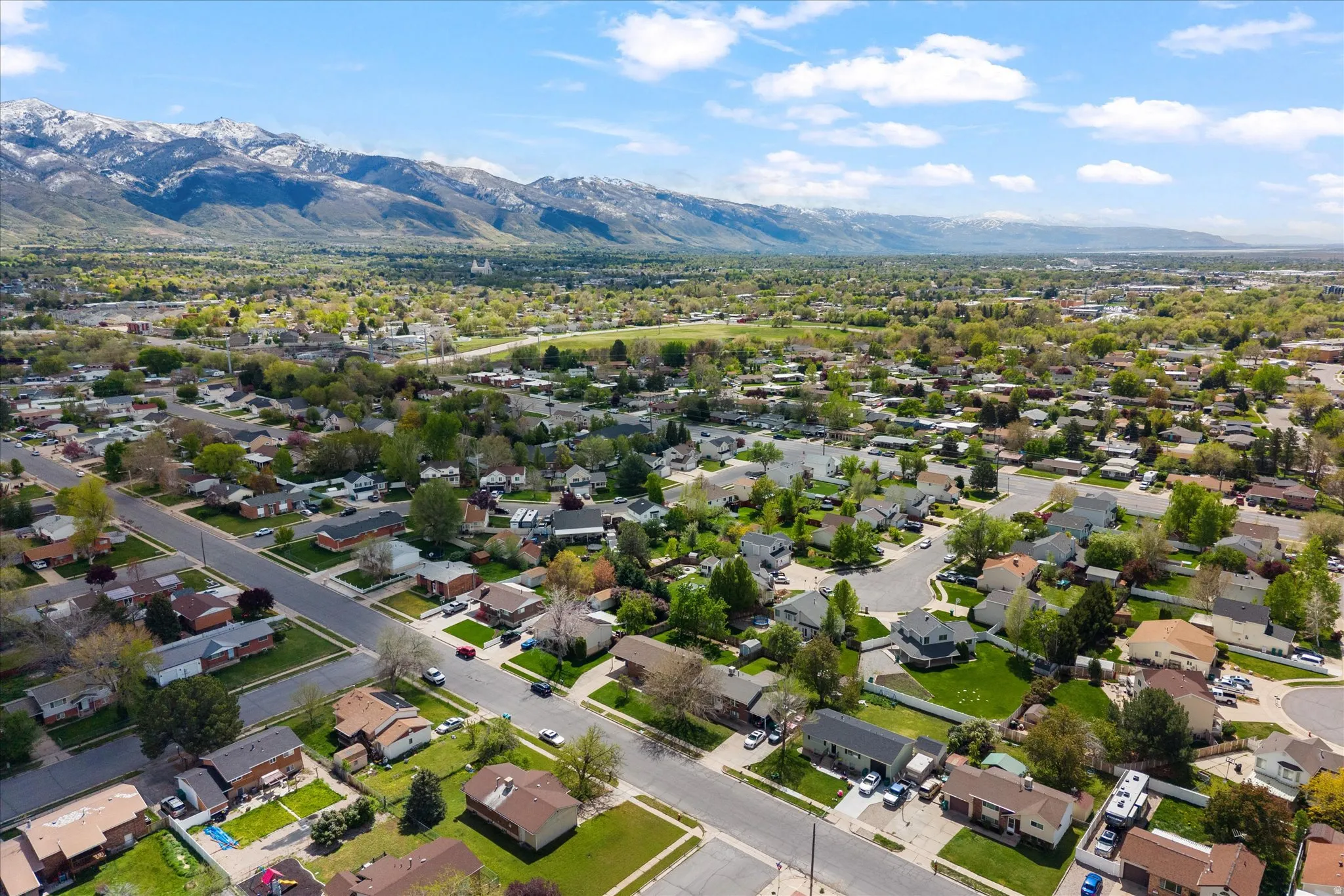 Aerial view of residential area with a mountainous background