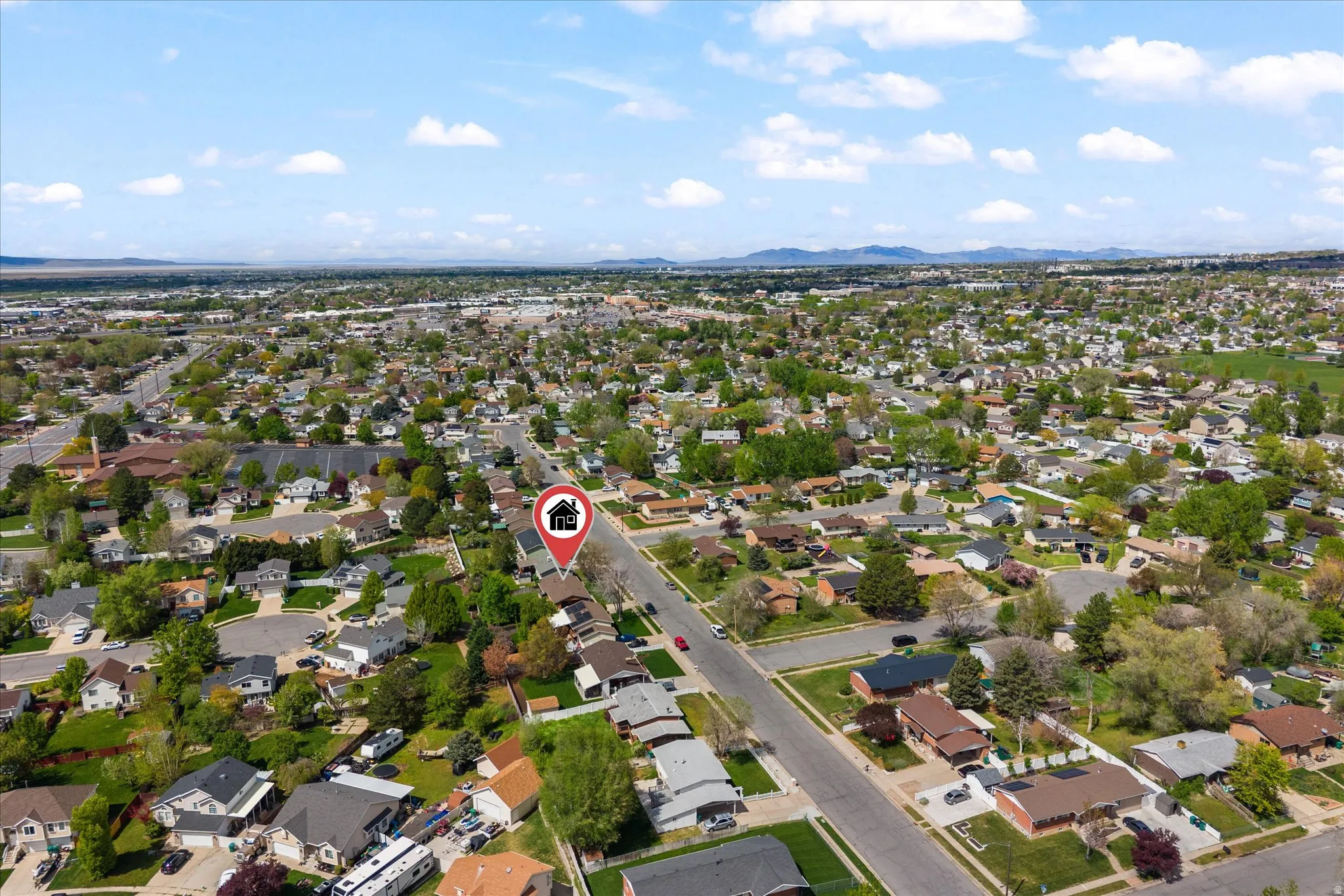 Aerial perspective of suburban area with mountains