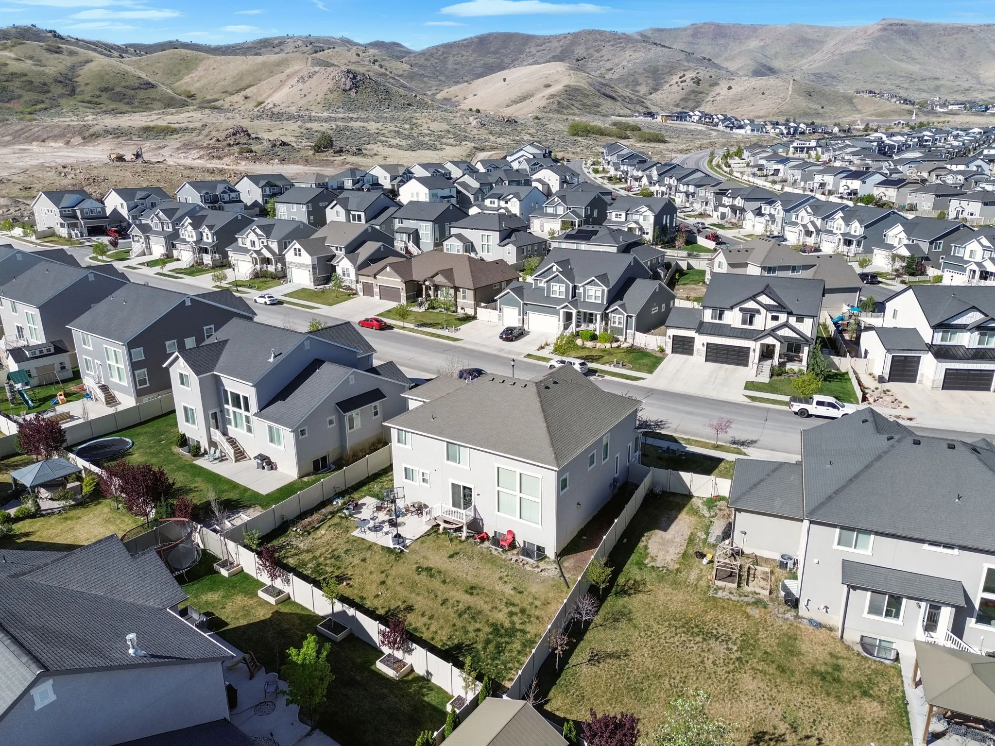 Aerial view of residential area with mountains