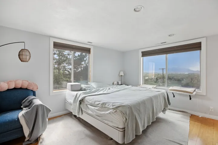 Bedroom with baseboards and light wood-style flooring