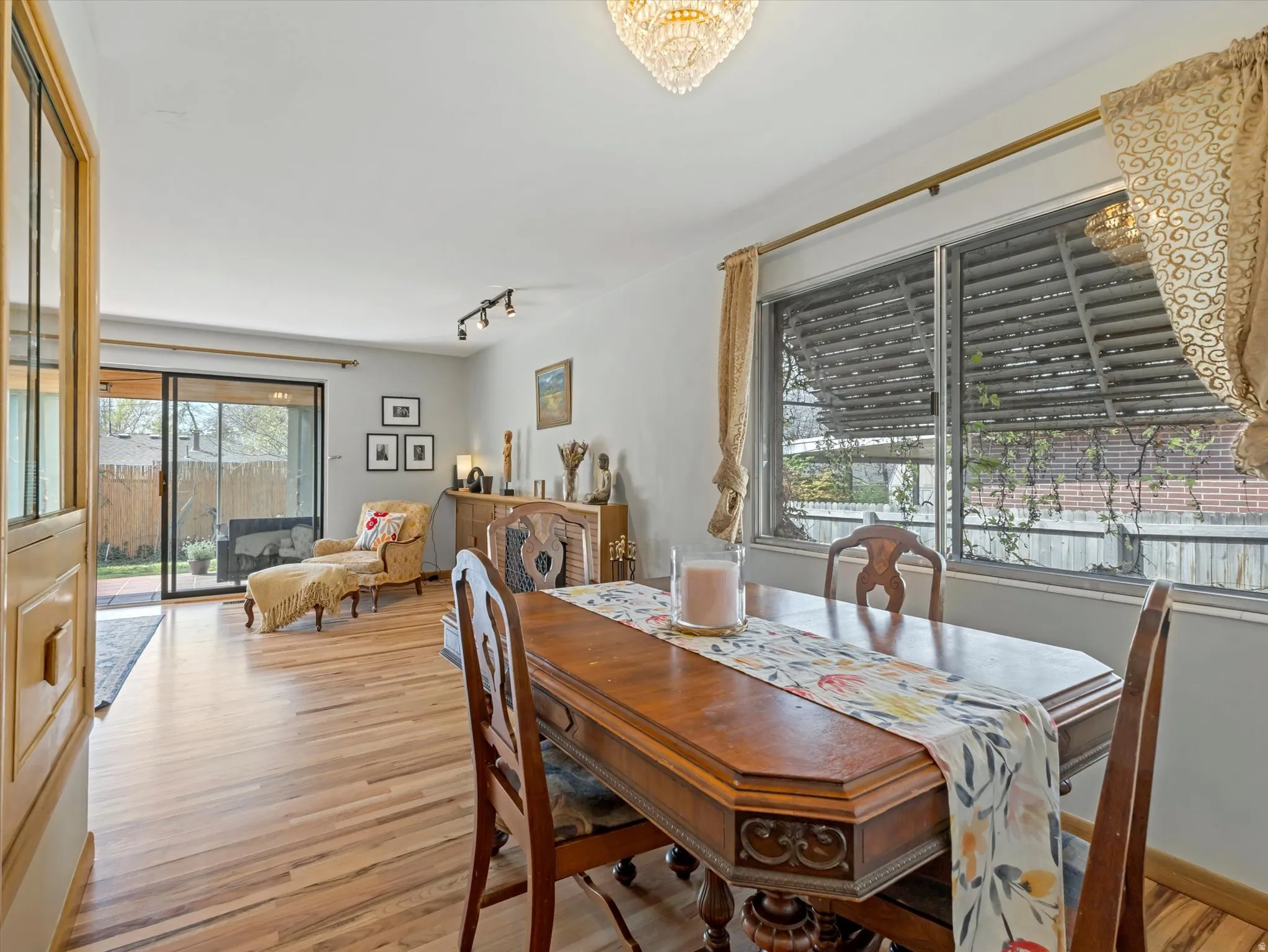 Dining area with built-ins opening onto the living room