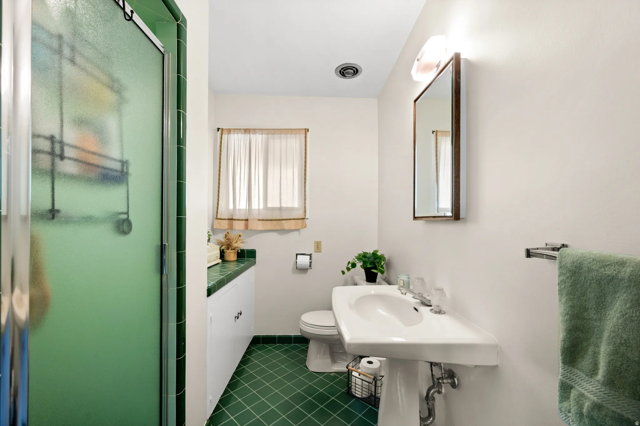 Main floor 3/4 bath with classic tile!