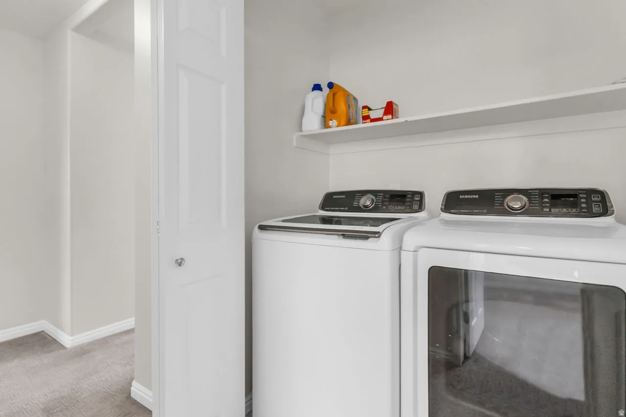 Laundry area with washer and dryer included