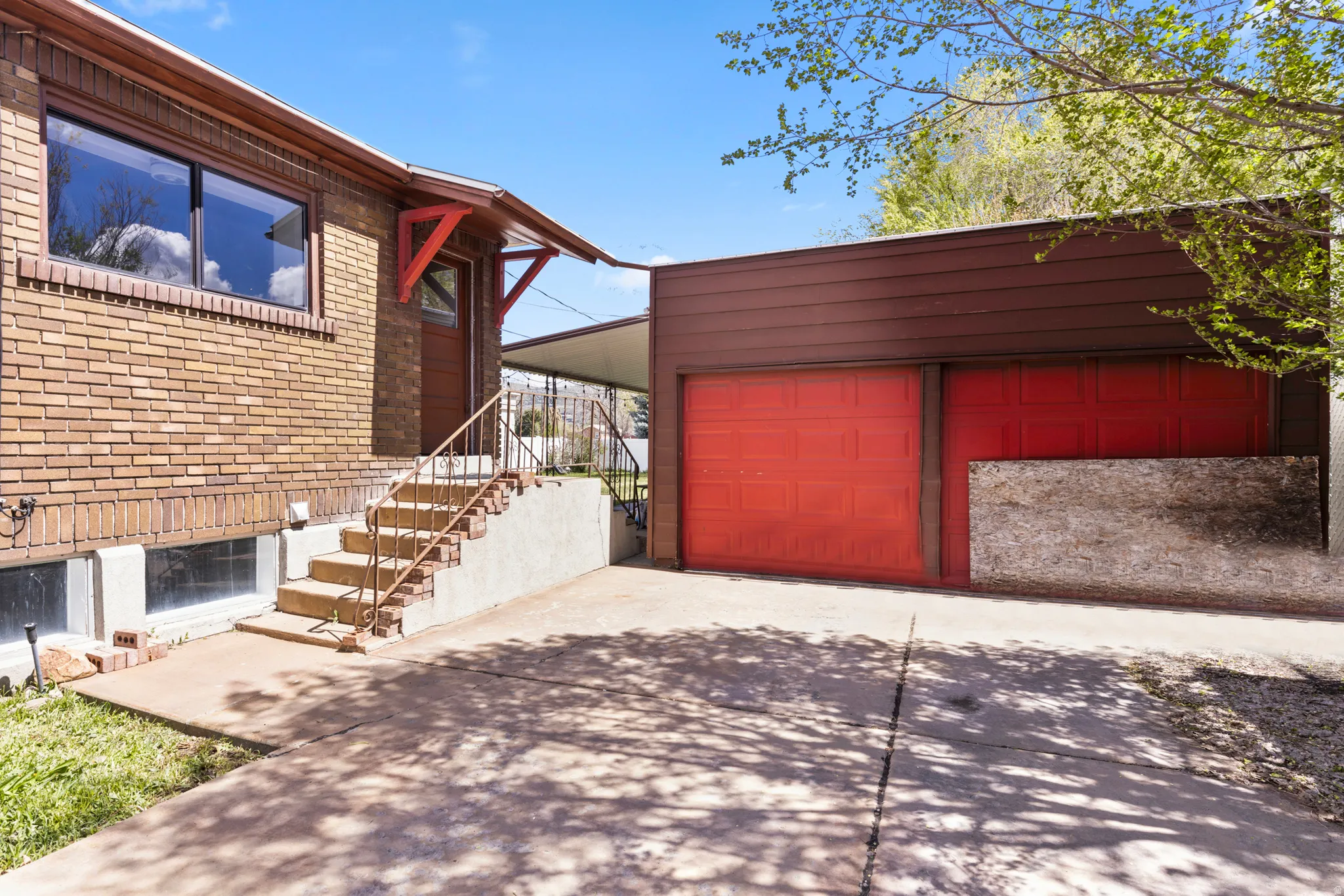 Garage with concrete driveway