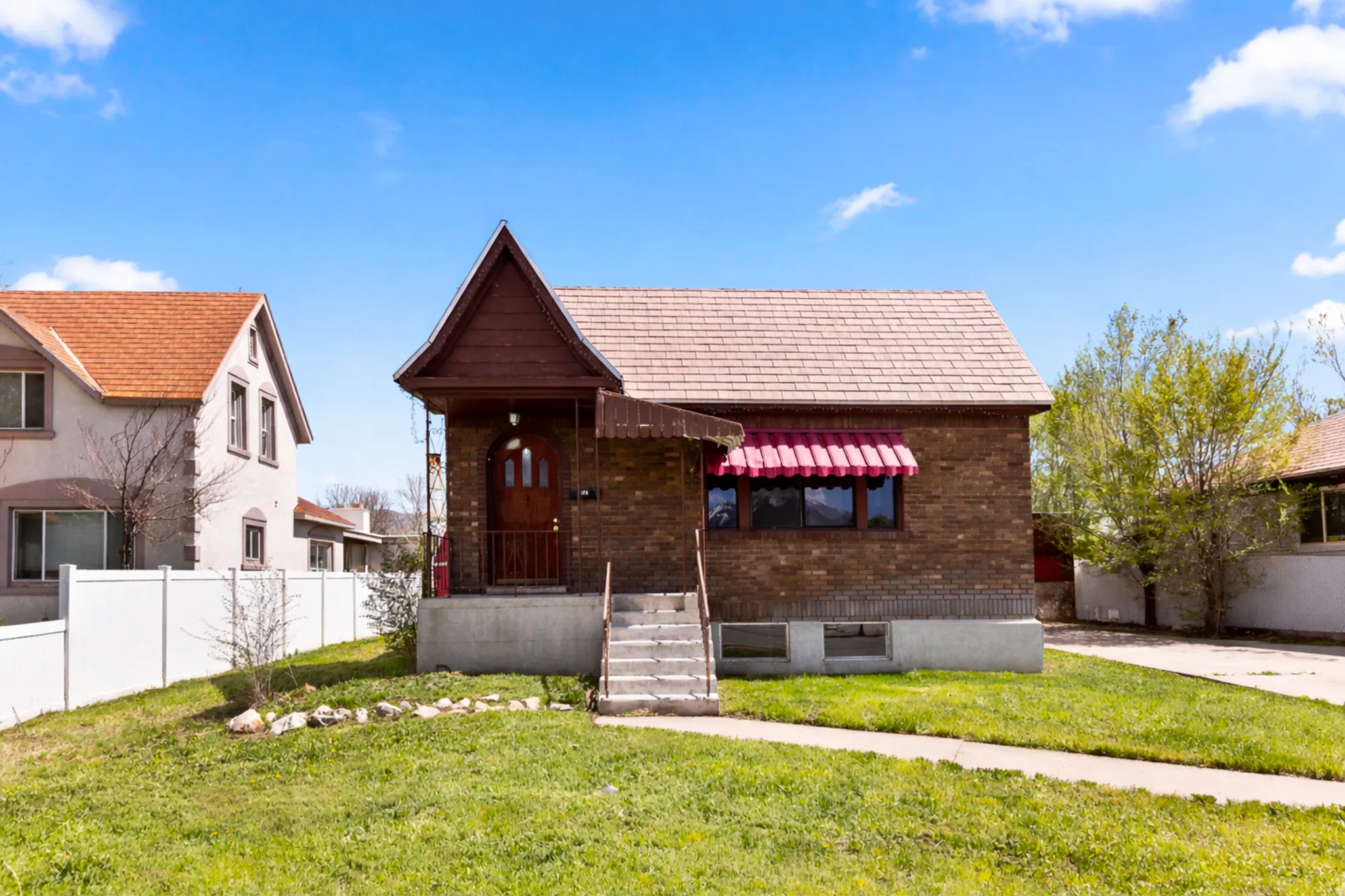 View of front of property with brick siding