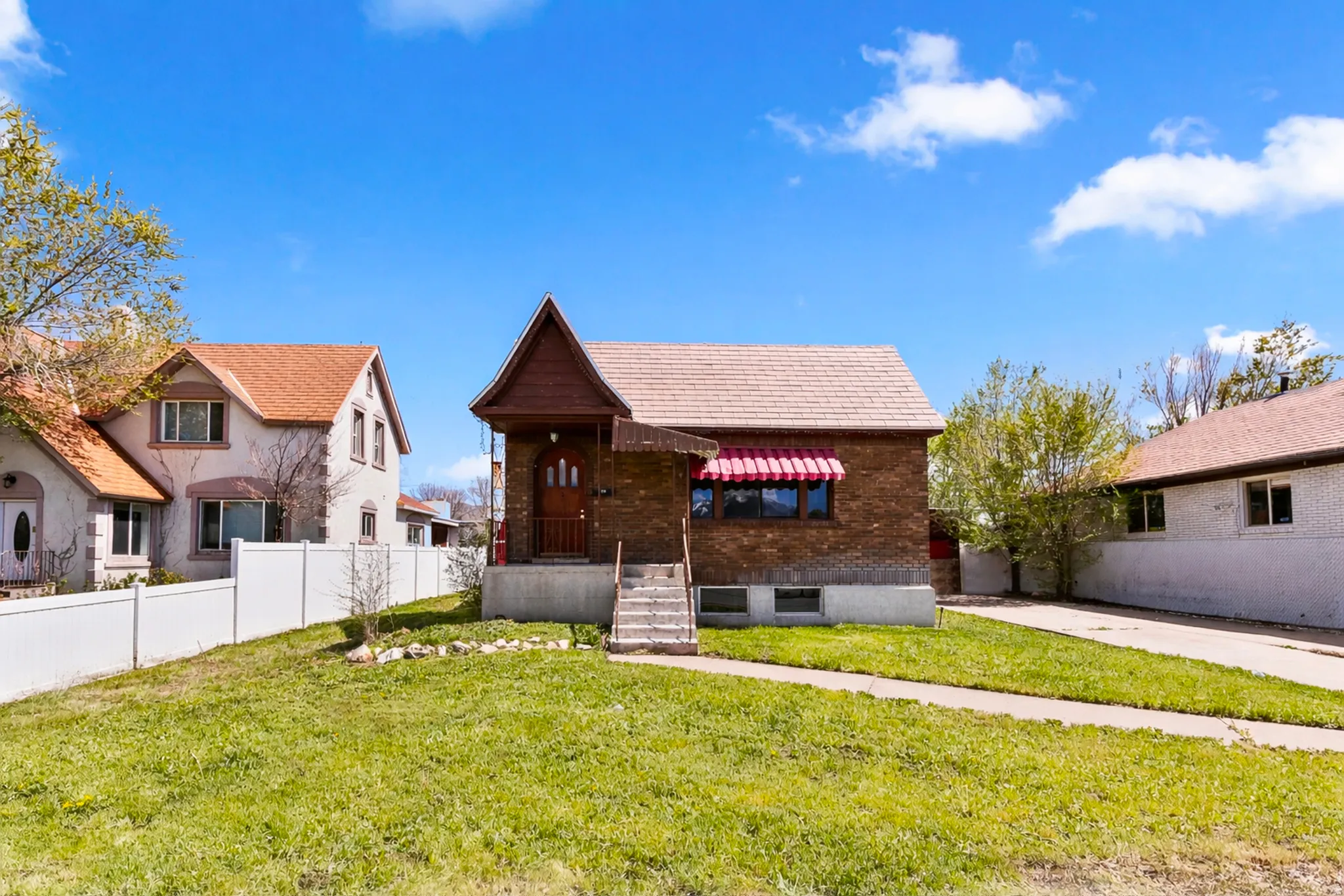 View of front of property with brick siding