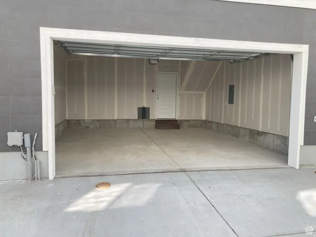 Garage featuring electric panel