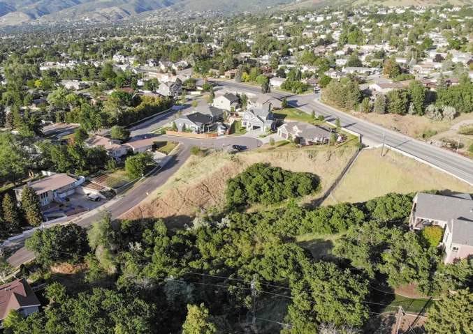 Aerial perspective of suburban area with mountains