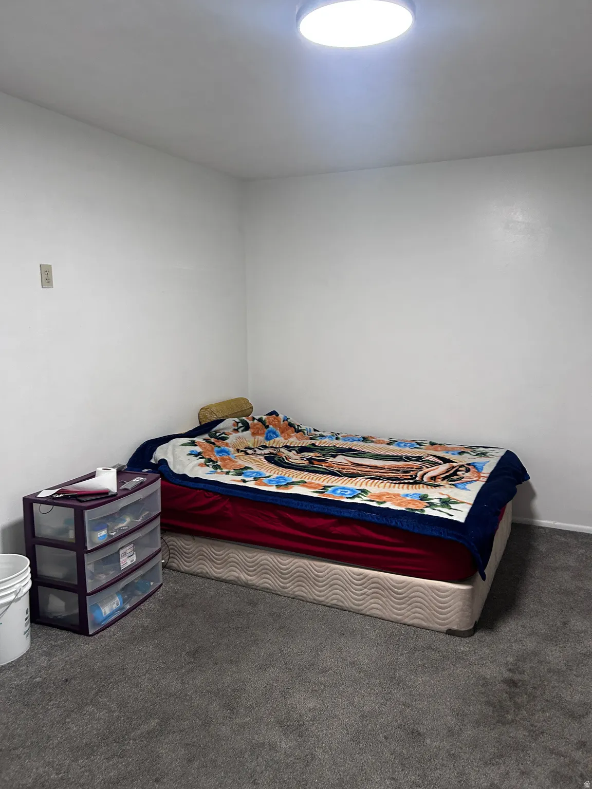 Bedroom with dark carpet