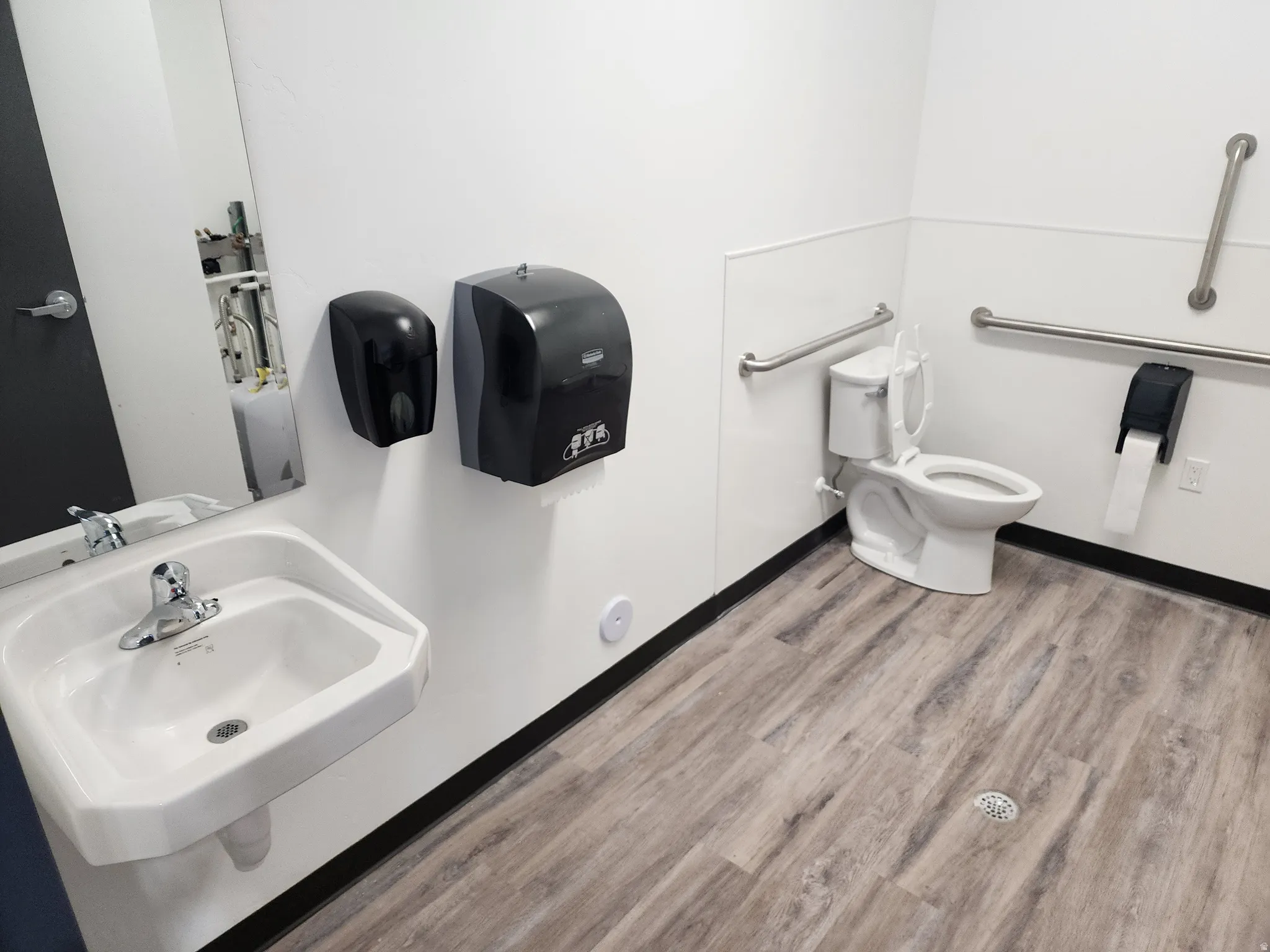 Bathroom featuring toilet and a sink