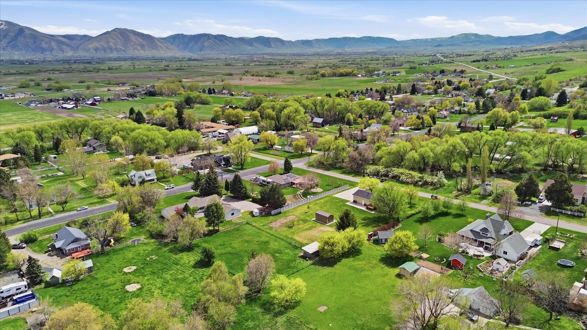 Aerial view of residential area featuring mountains