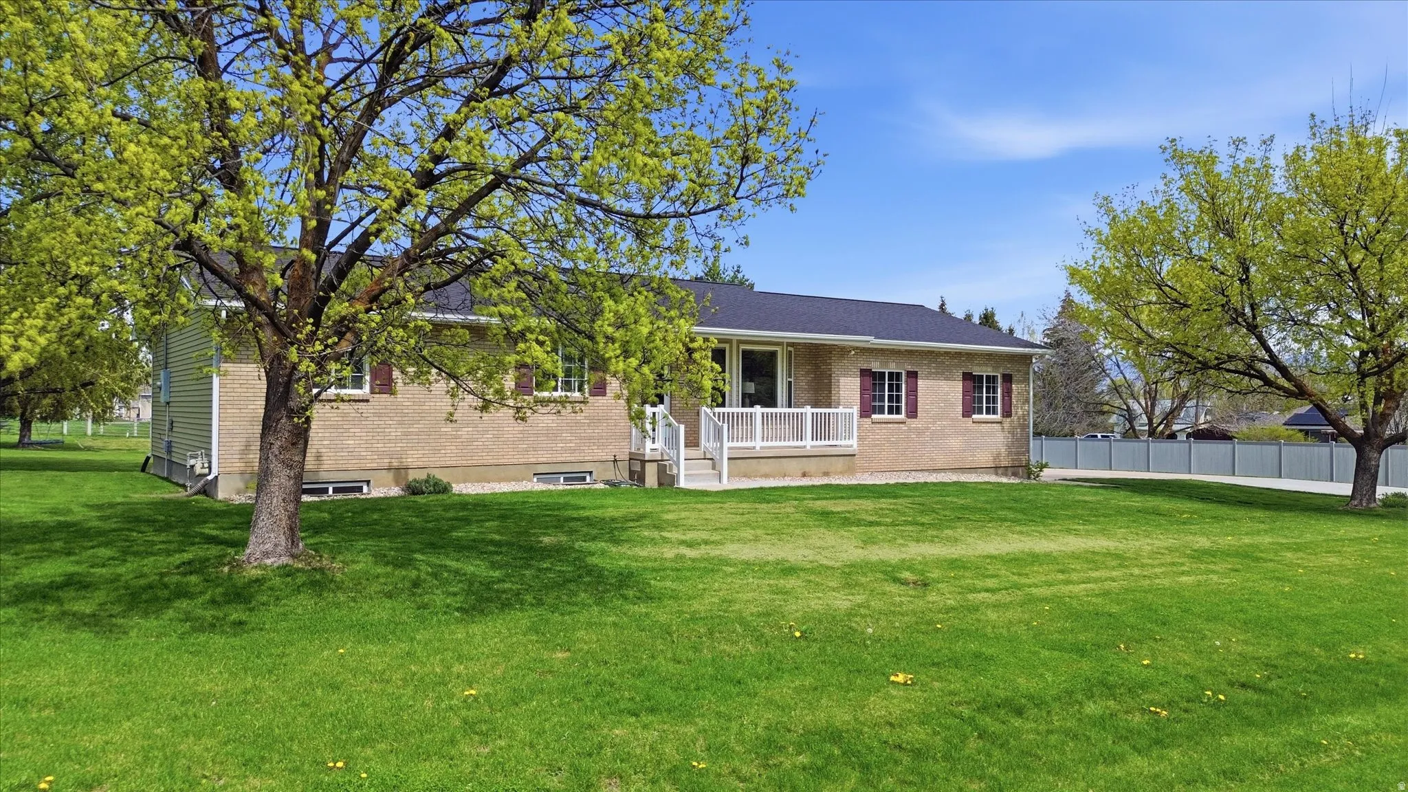 View of front of house featuring brick siding
