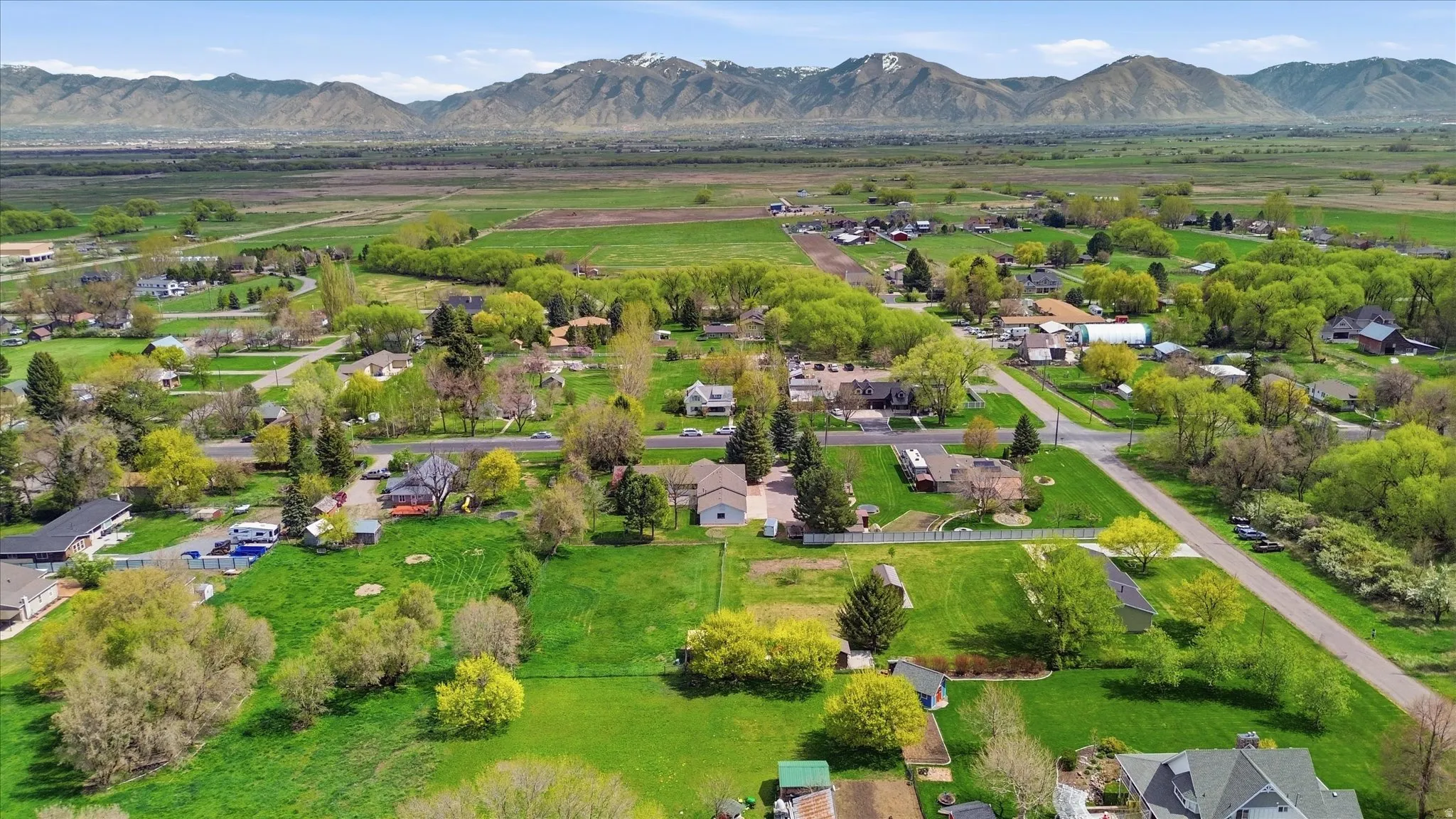 Aerial view of residential area with a mountain backdrop