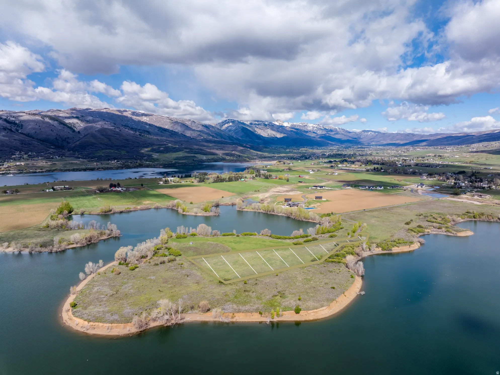 Drone / aerial view of a water and mountain view