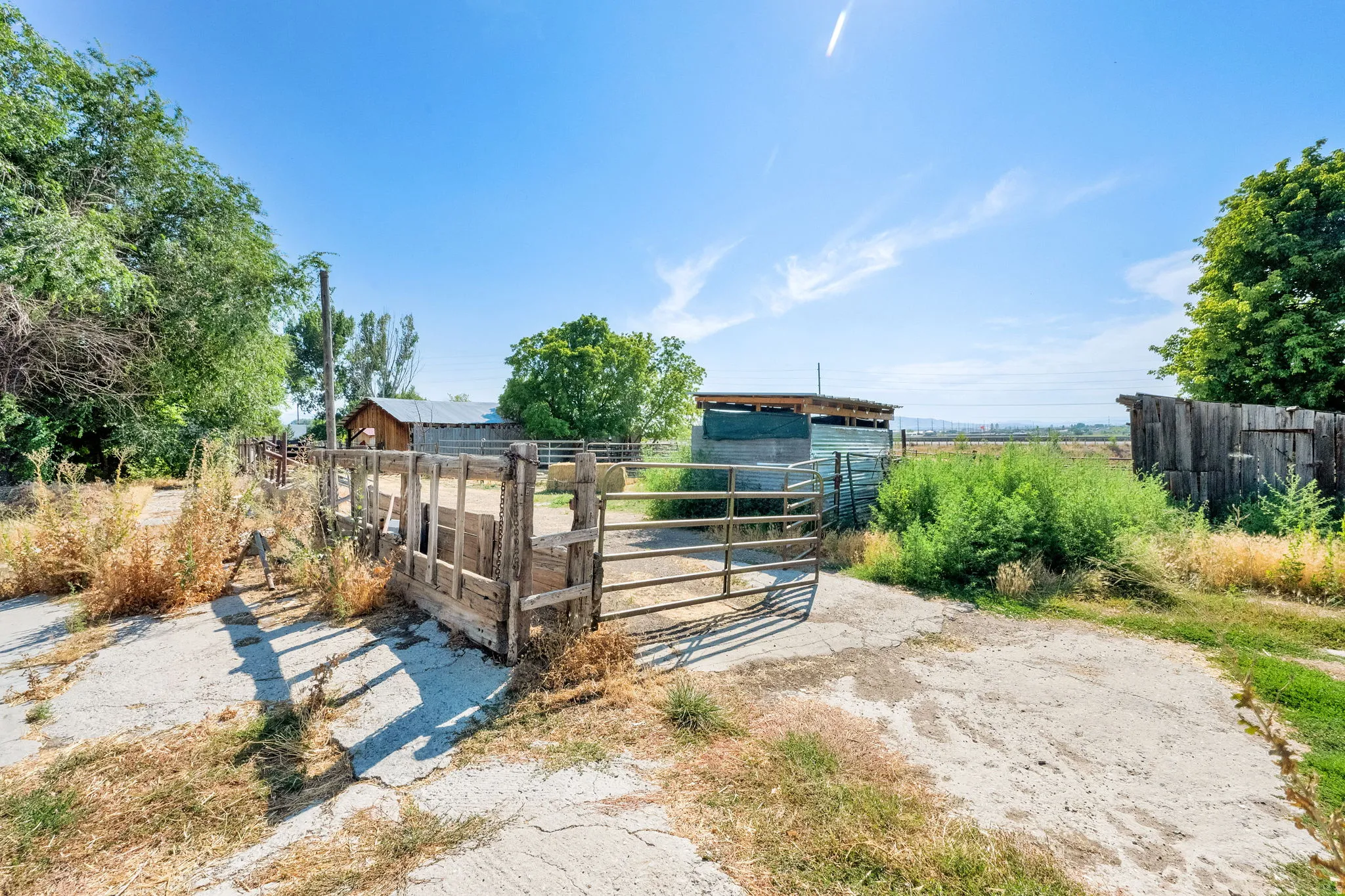 Gate featuring an outbuilding and an exterior structure