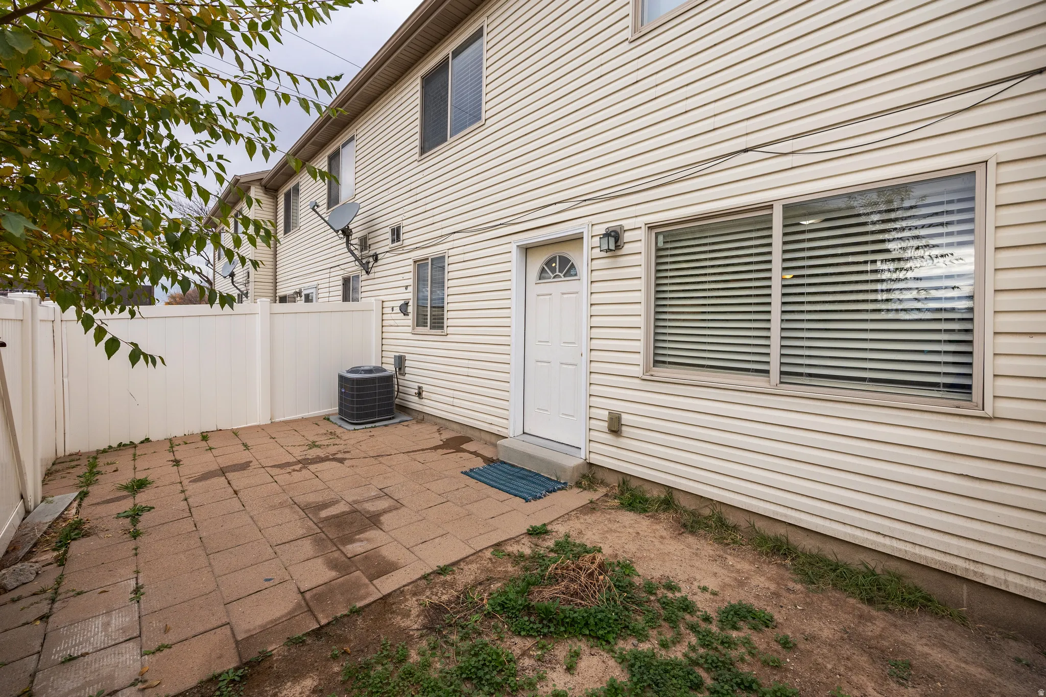 View of back patio / terrace with back entrance to house