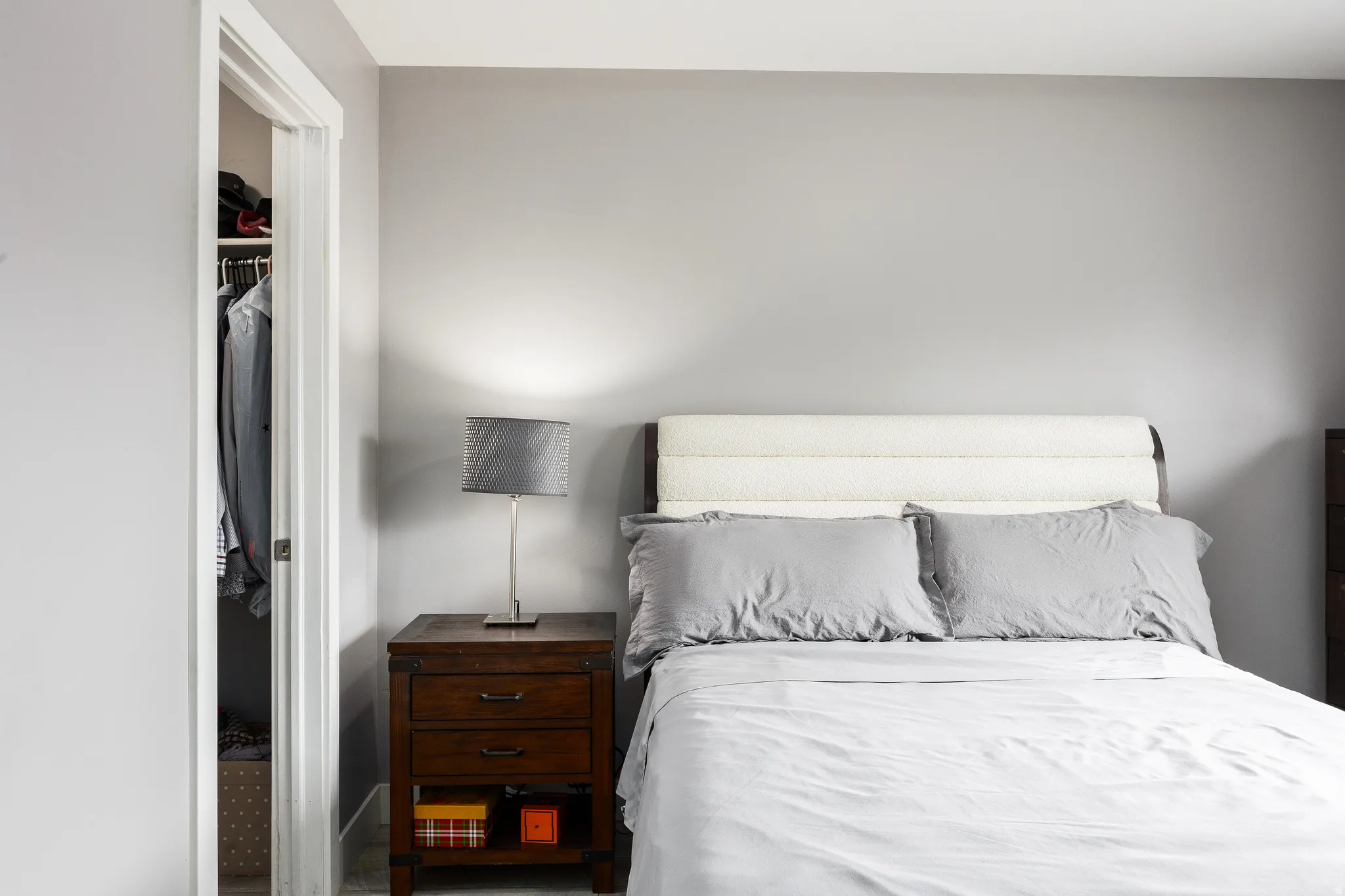 Primary suite featuring LVP flooring and walk-in closet