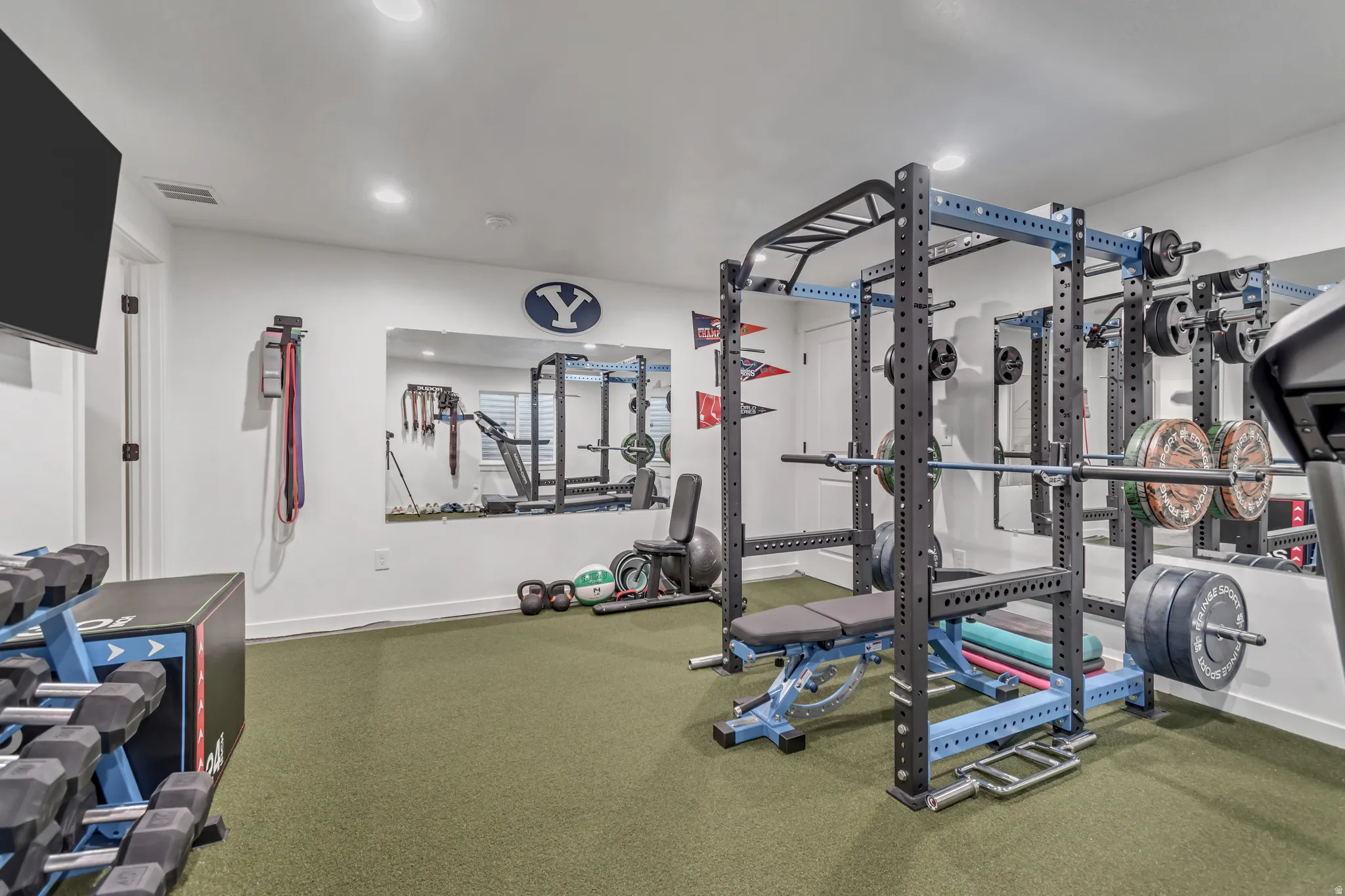 Workout area featuring recessed lighting