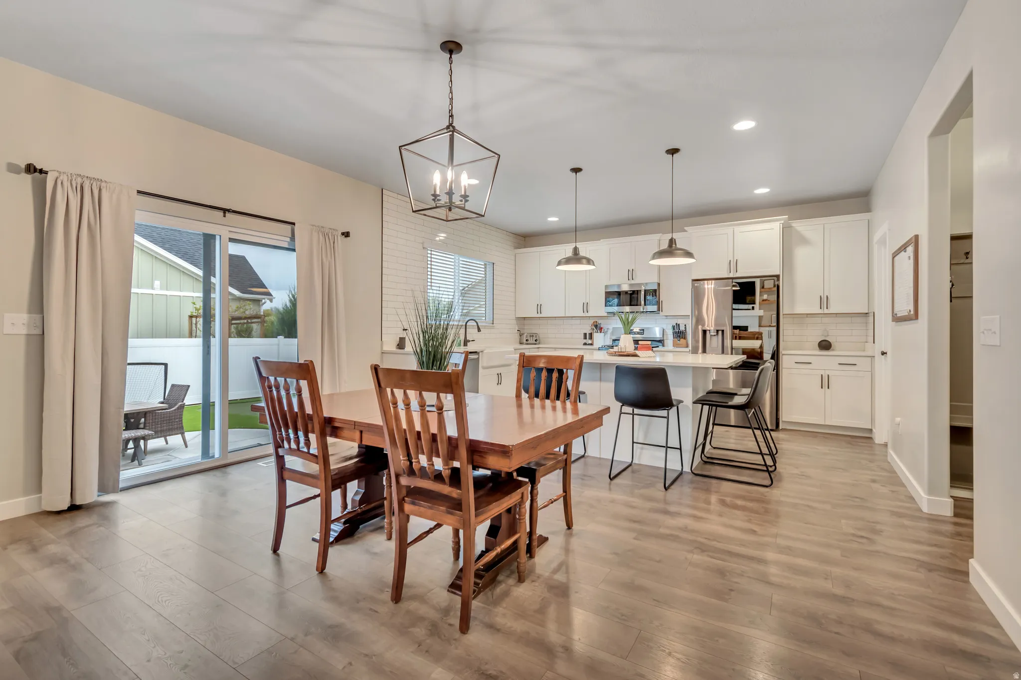 Dining area with sliding door to backyard