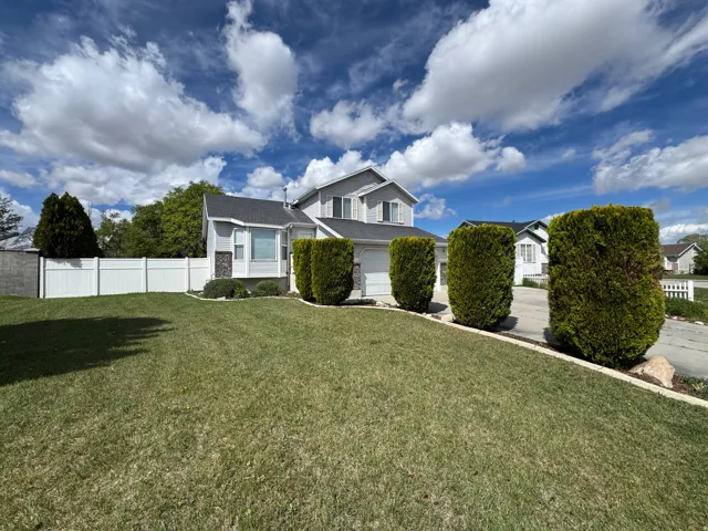 View of front of home featuring an attached garage