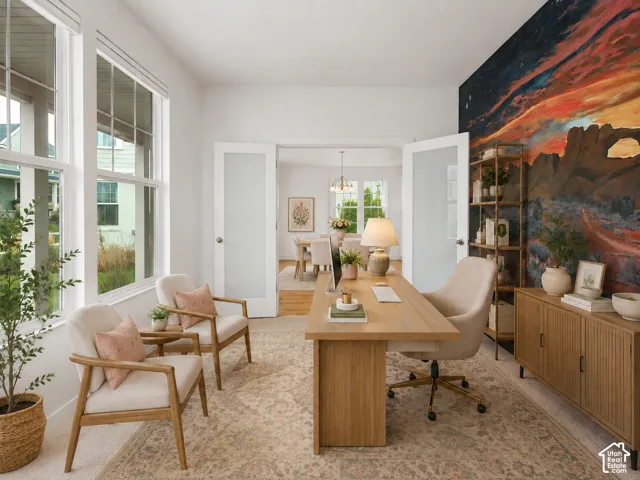 Brightly lit room featuring large windows, double frosted glass doors, and a custom accent wall, AI staged