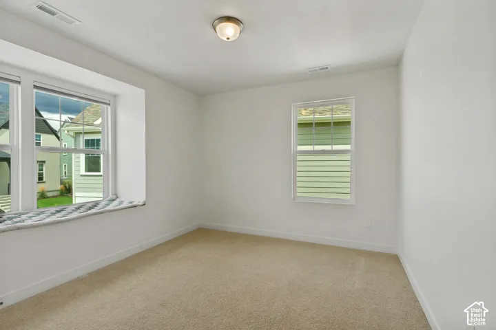 Built-in window bench, flush mount ceiling light, tons of natural light,