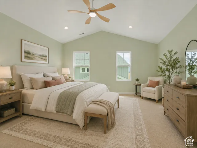 Primary bedroom suite featuring vaulted ceilings with ceiling fan, recessed lighting, AI staged