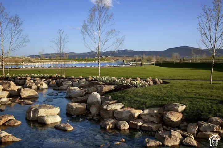Surrounding Daybreak community with a water and mountain view