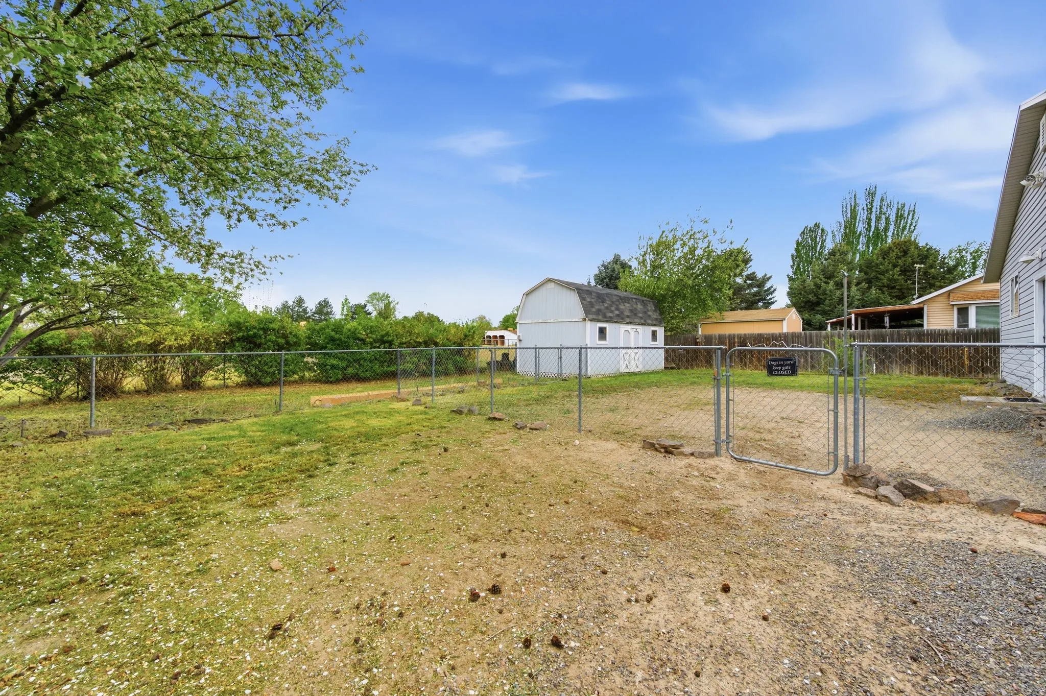 View of yard featuring a gate
