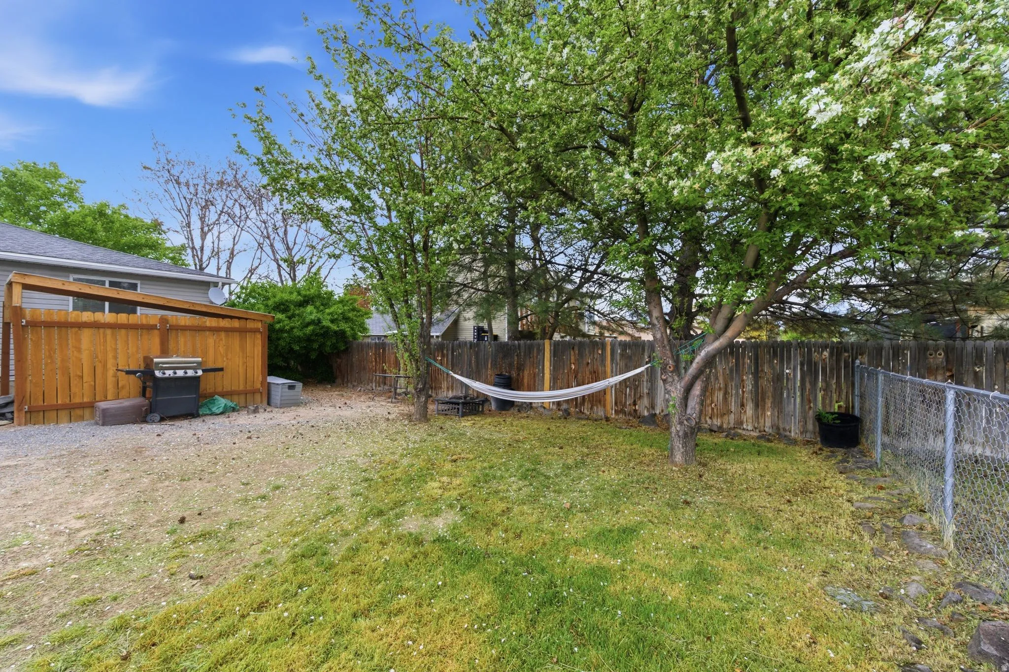 View of fenced backyard