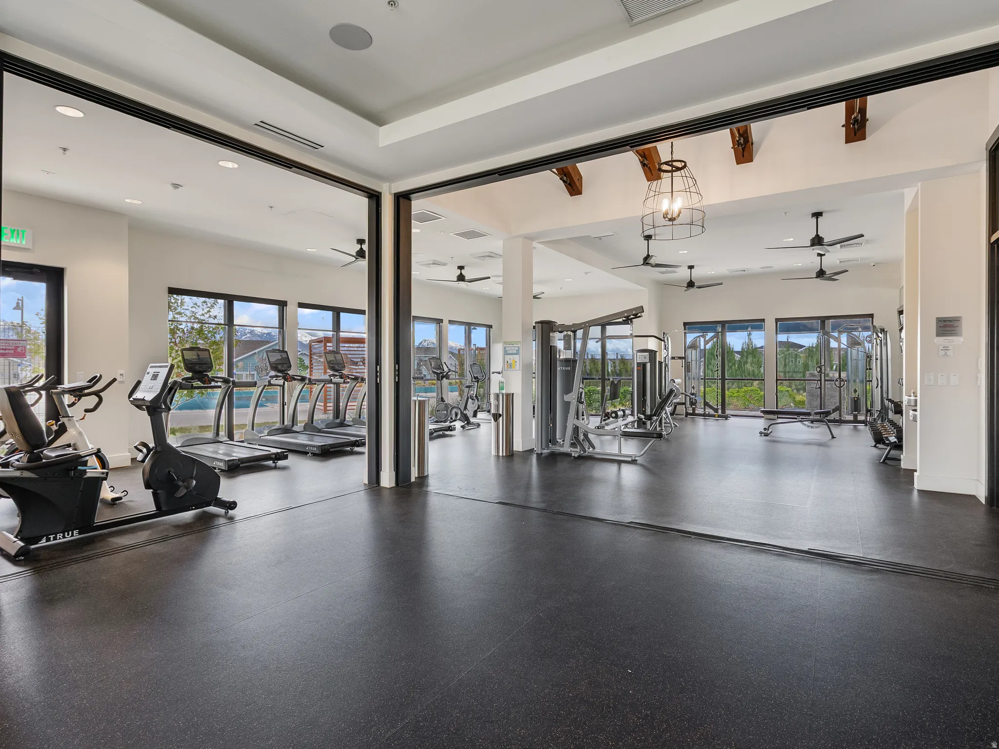 Exercise room with recessed lighting and ceiling fan