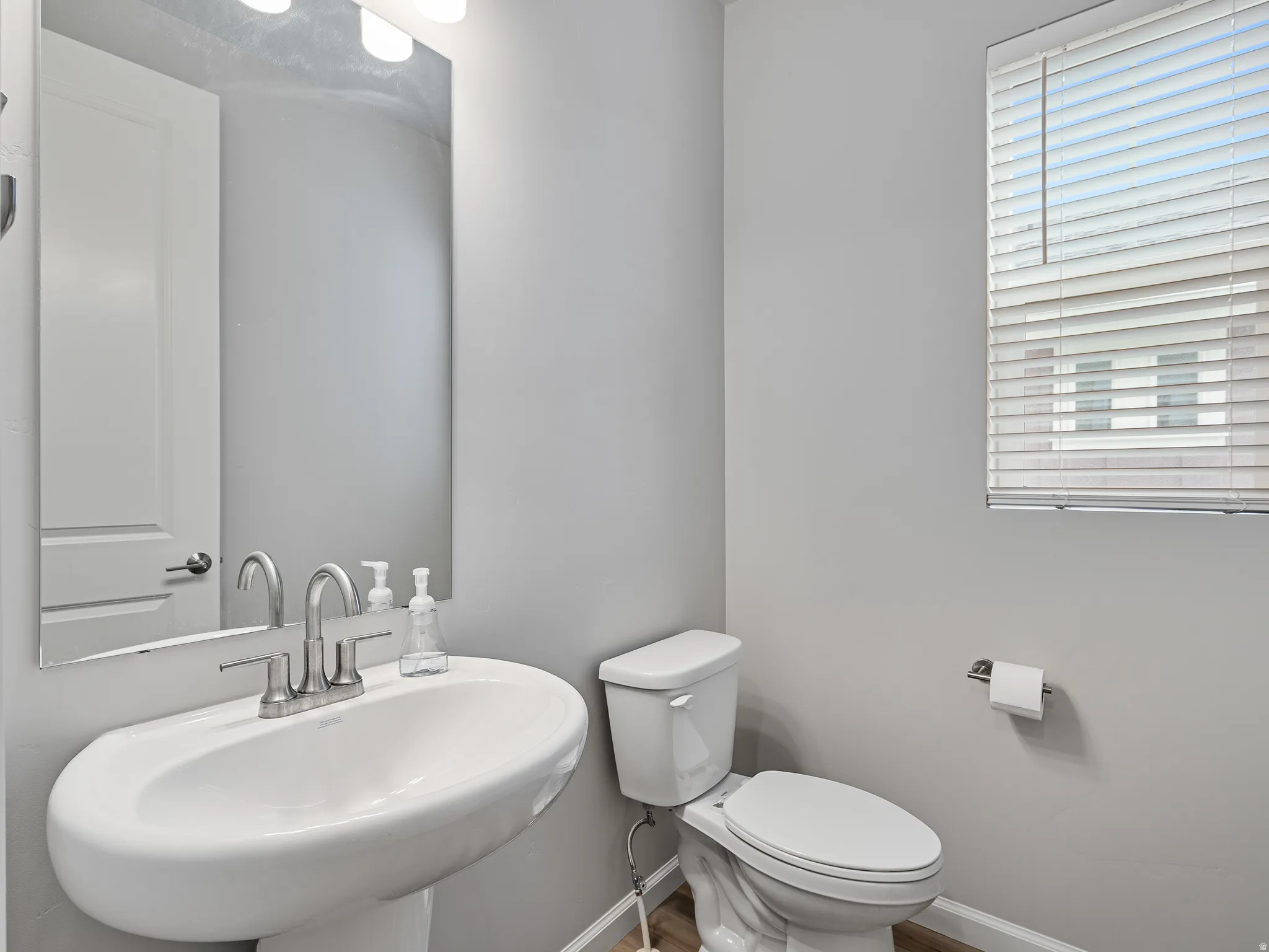 Half bath with plenty of natural light