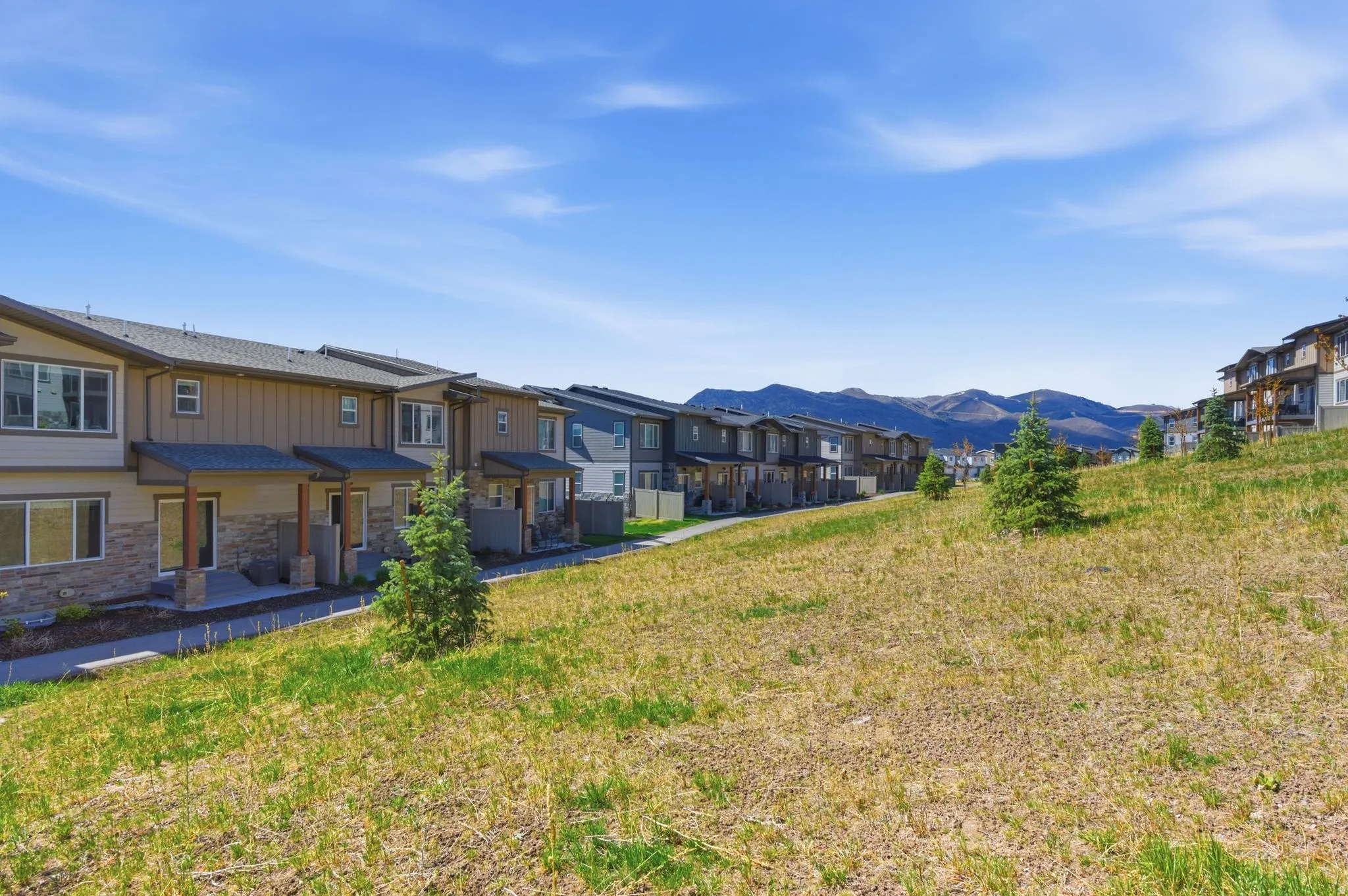 View of yard featuring a mountain view and a residential view