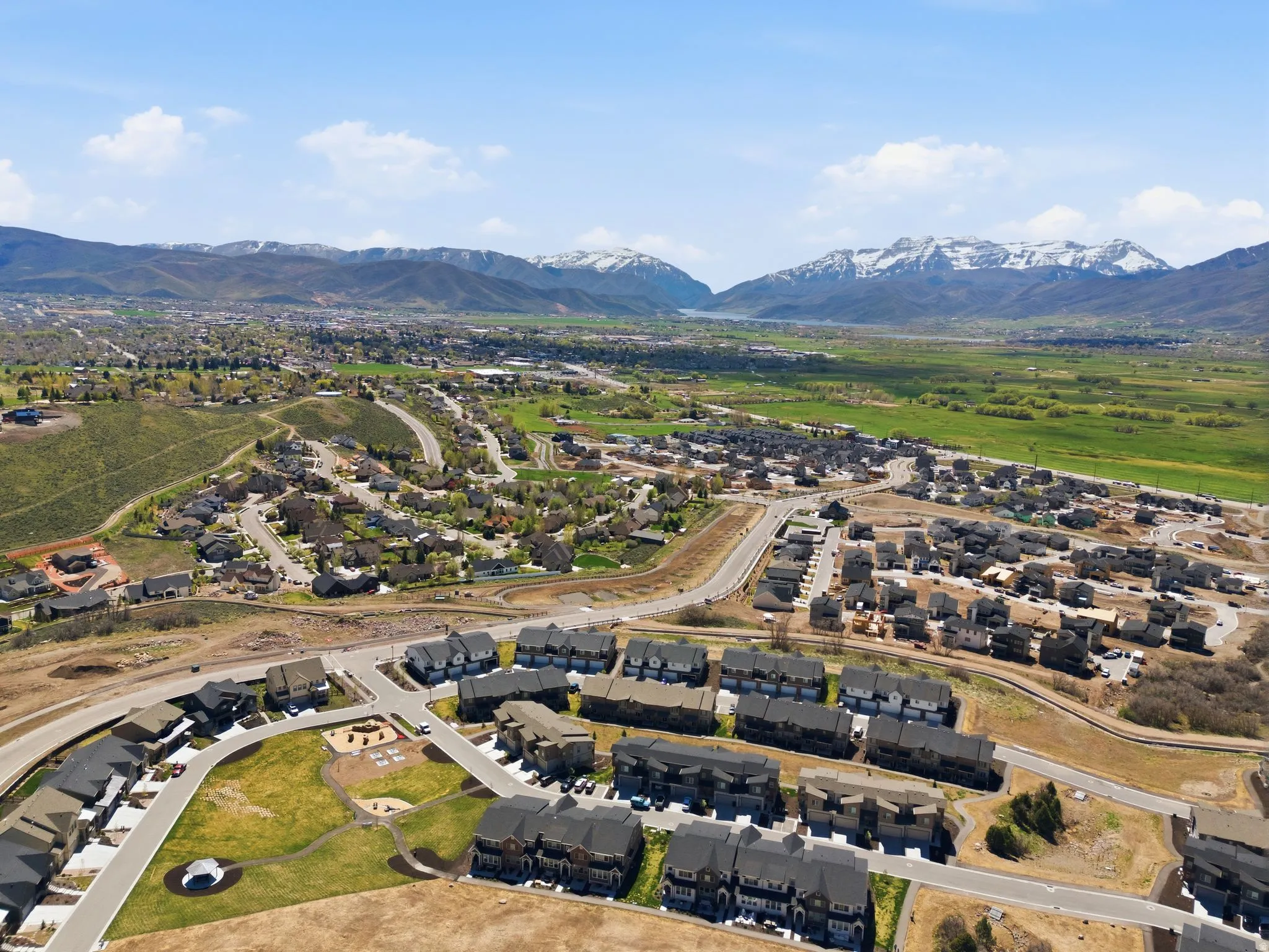 Aerial view of residential area featuring mountains