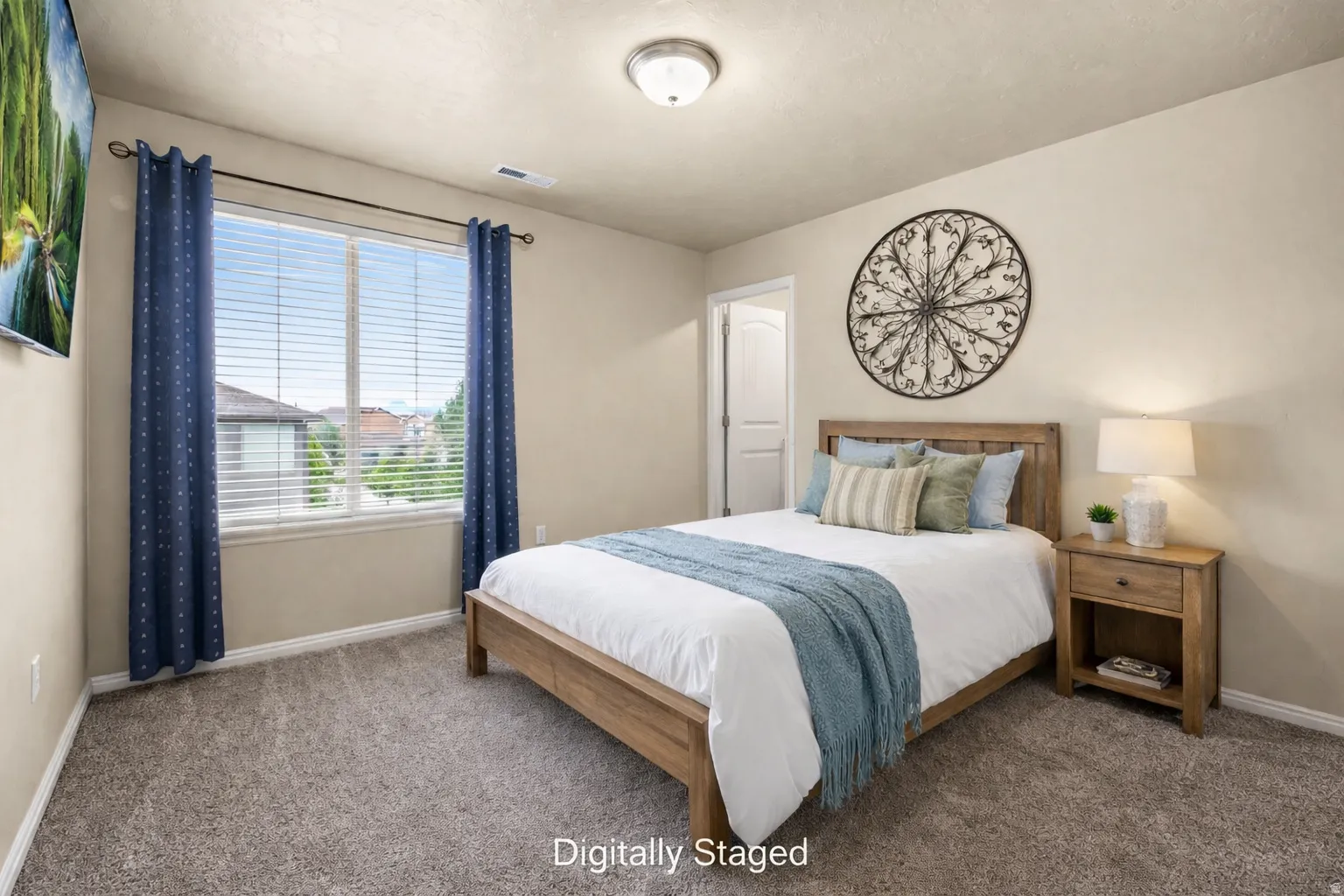 Digitally Staged, carpeted guest bedroom