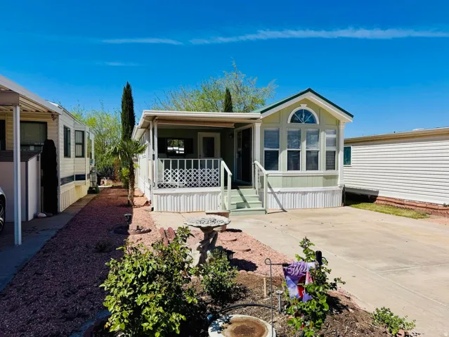 Manufactured / mobile home featuring covered porch