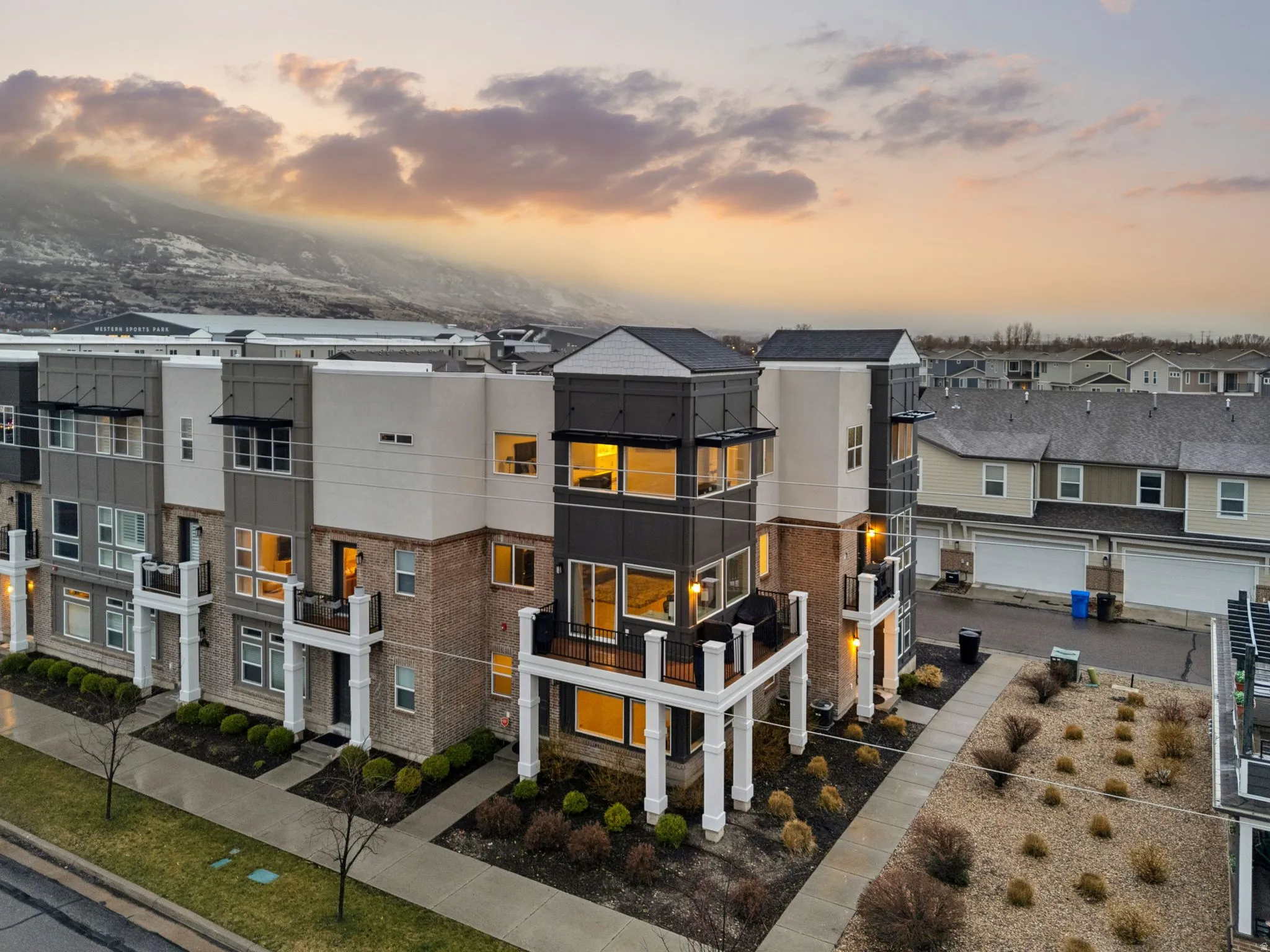 View of front of property with brick siding and a residential view