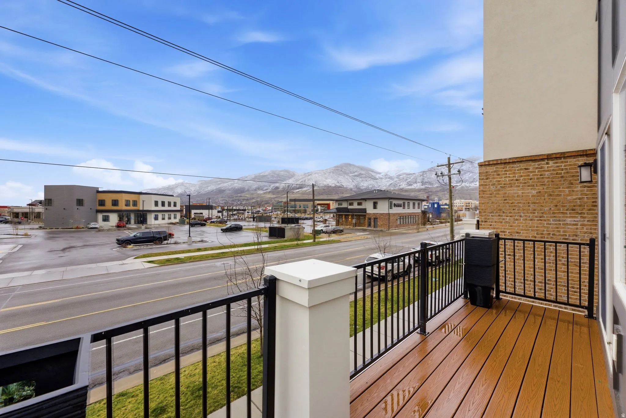 Balcony featuring a mountain view and a residential view
