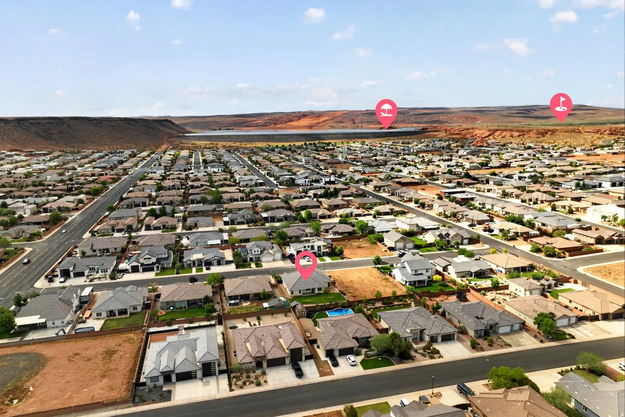 Aerial overview of property's location featuring nearby suburban area